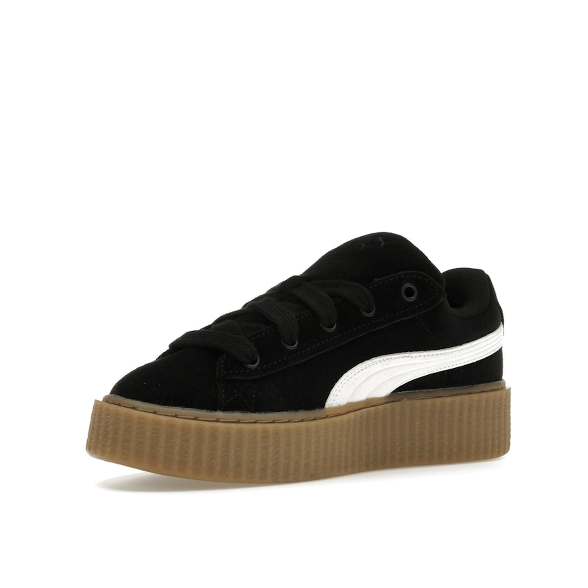 Puma Creeper Phatty Rihanna Fenty sneakers, front view, model 396403-01, in black with platform sole.