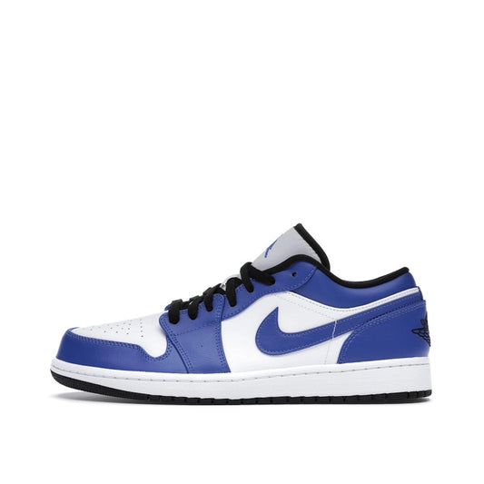 Jordan 1 Low Game Royal sneakers, side view, in blue and white with black overlays.