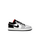 Jordan 1 Low kids in black leather with summit white and infrared accents