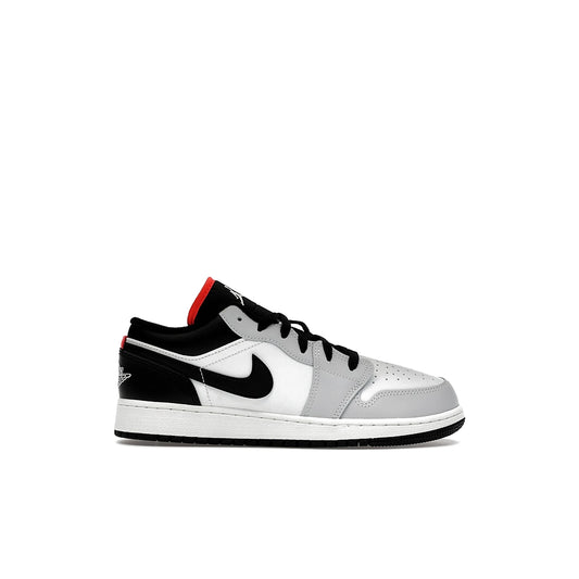 Jordan 1 Low kids in black leather with summit white and infrared accents