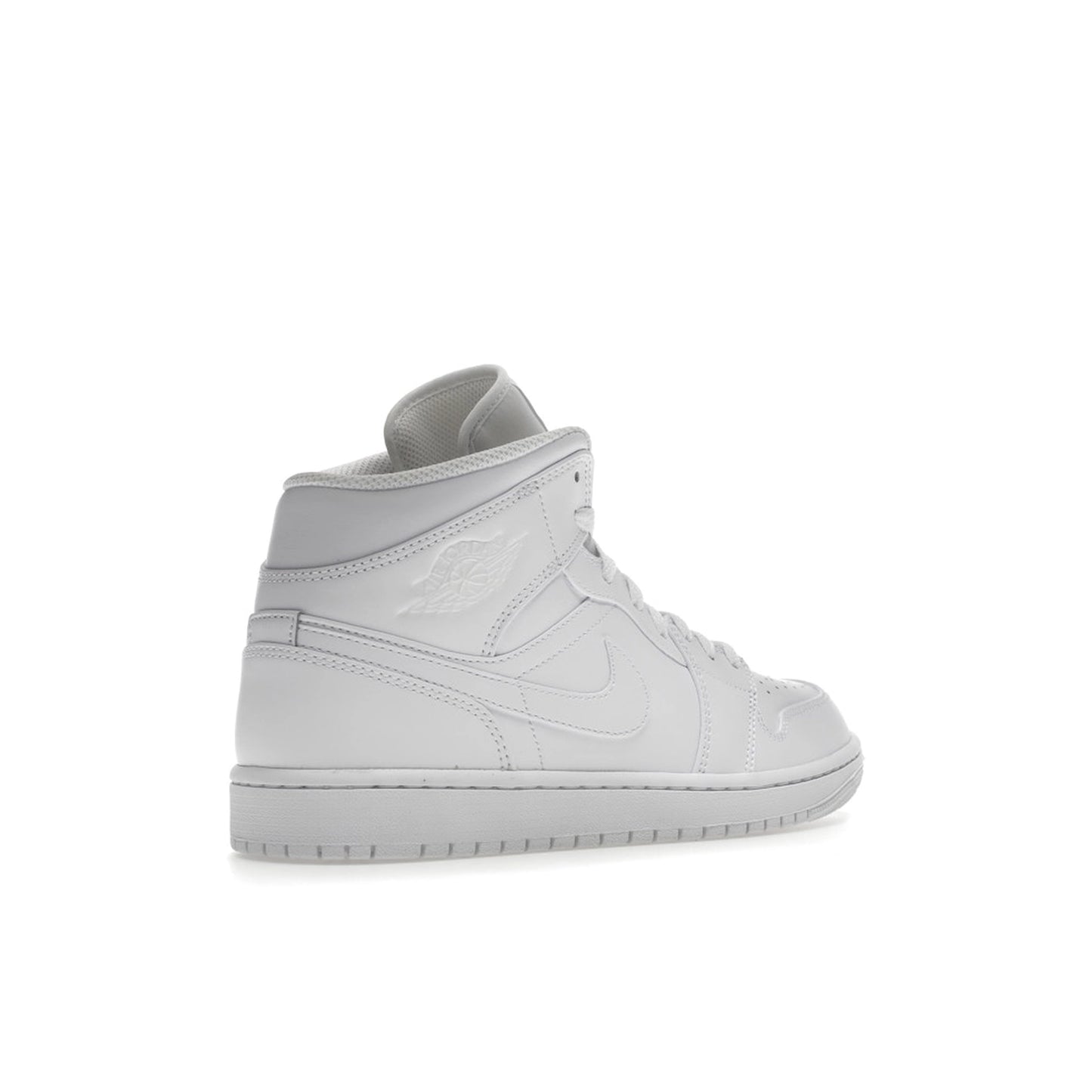 Air Jordan 1 Mid, back view, classic silhouette in full triple white colorway.