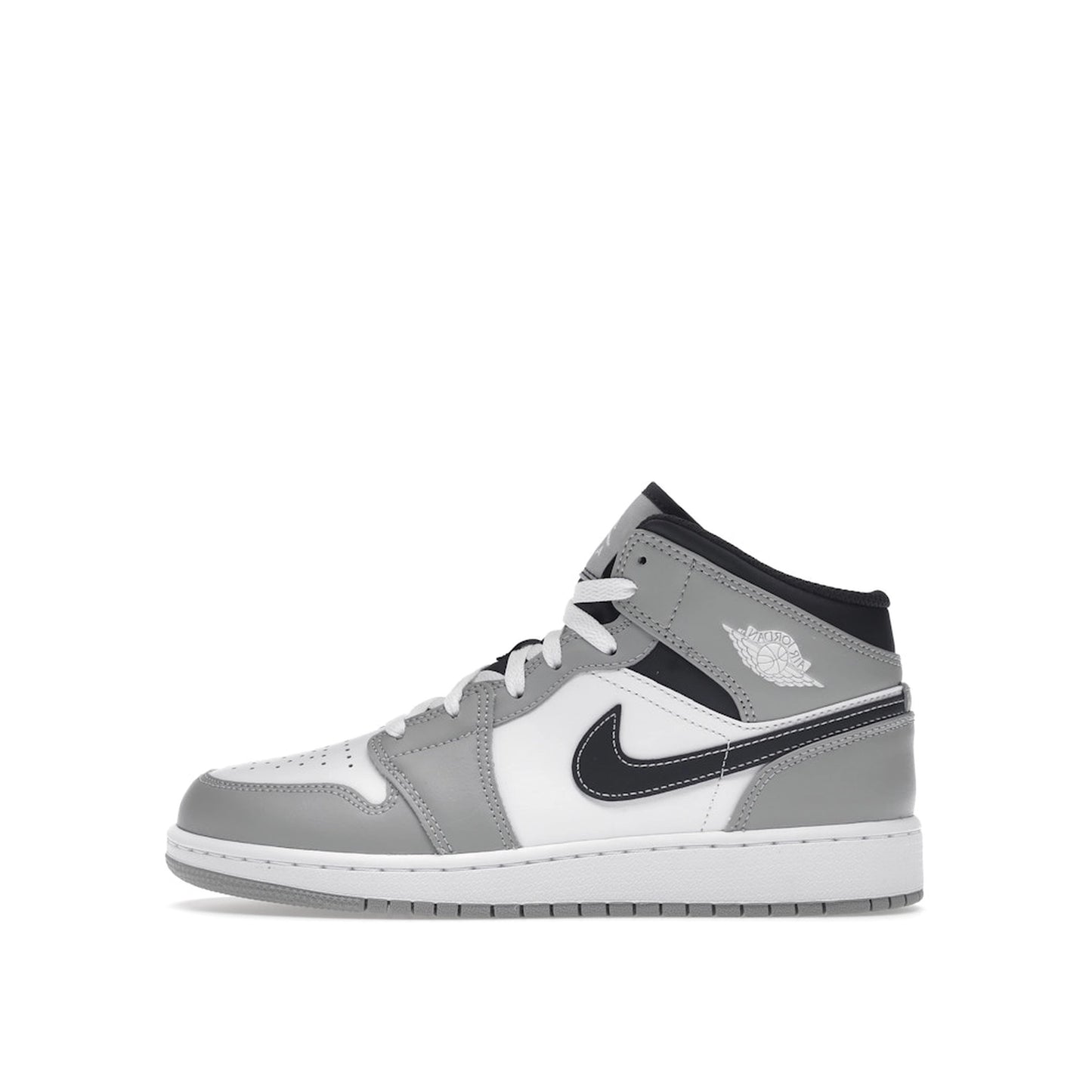 Jordan 1 Mid sneakers (GS), side view, model 554725-078, in light smoke grey with black and white accents.