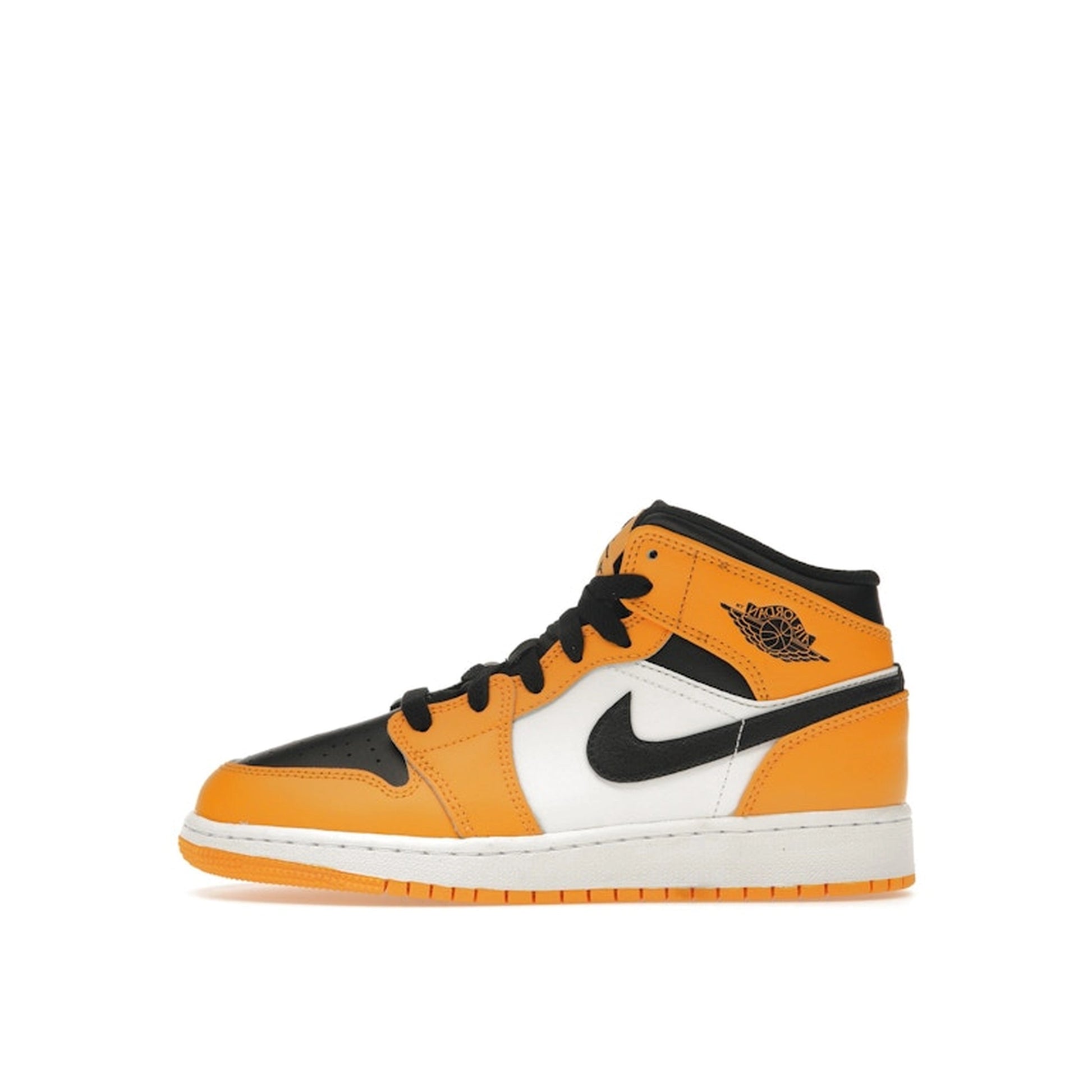 Jordan 1 Mid GS sneakers, side view, in yellow and black with classic Jordan design.