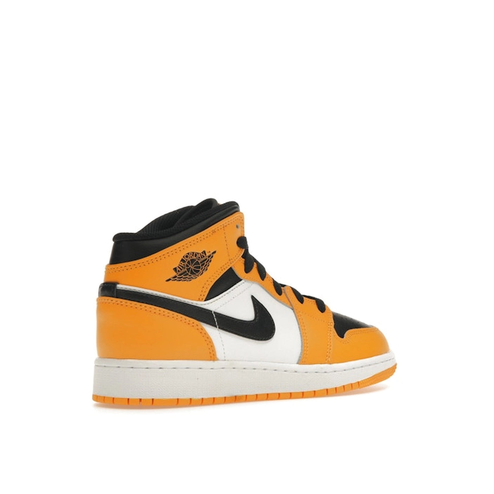 Jordan 1 Mid GS sneakers, back view, in yellow and black with classic Jordan design.