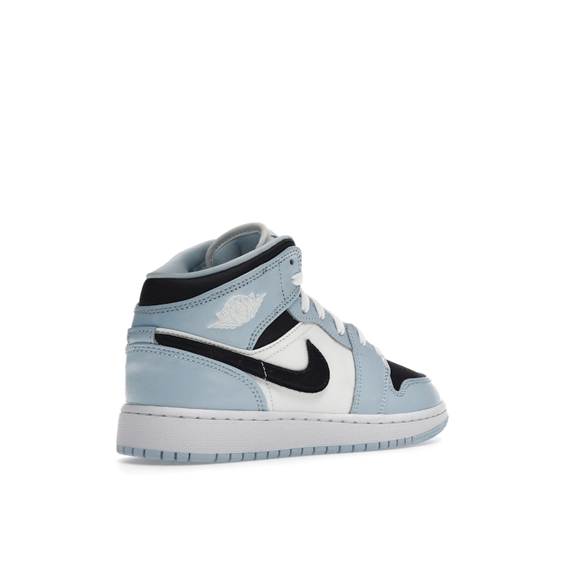 Jordan 1 Mid Ice Blue GS sneakers, back view, in ice blue with white and black details.