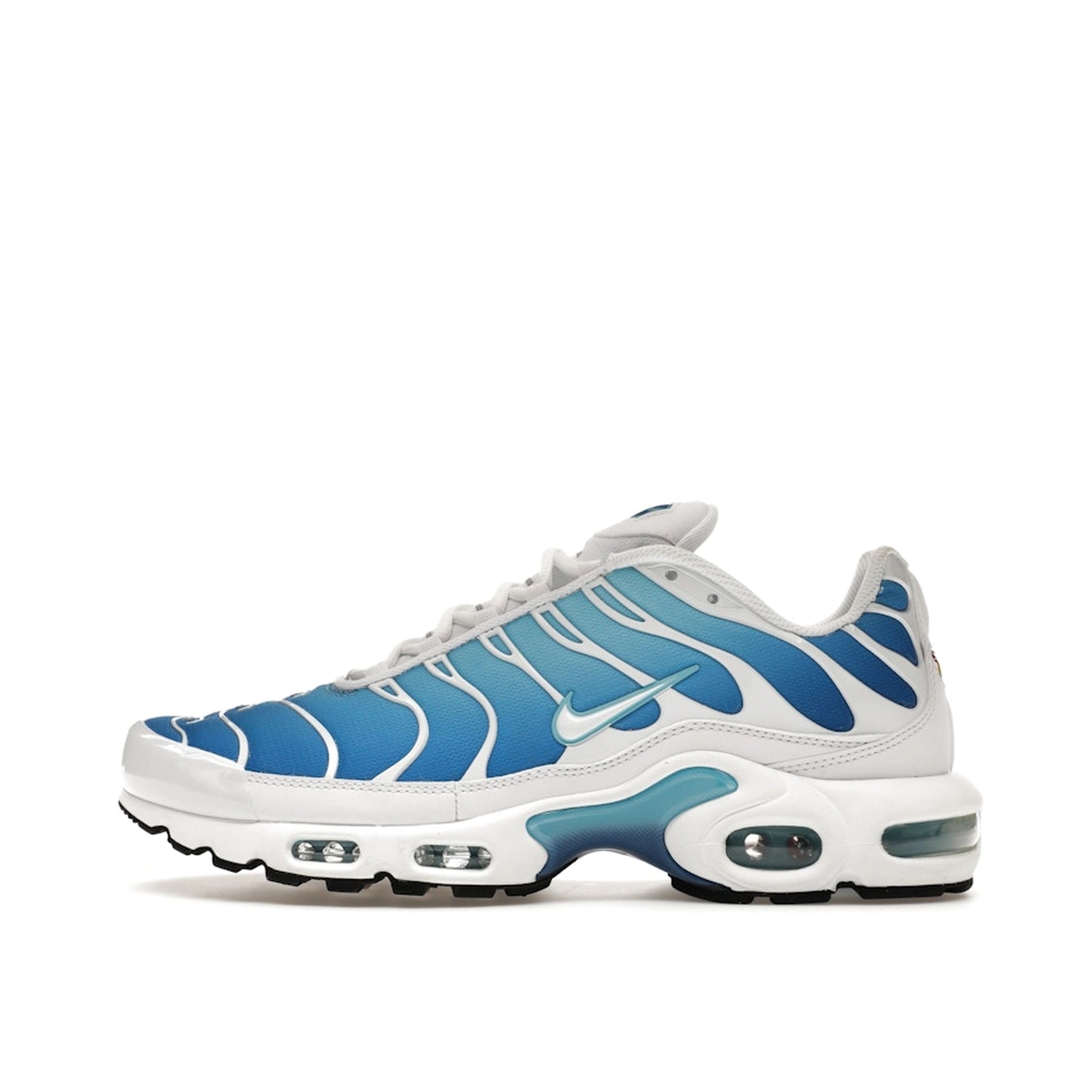 Nike Air Max Plus sneakers, side view, model 852630-411, in sky blue with black accents.