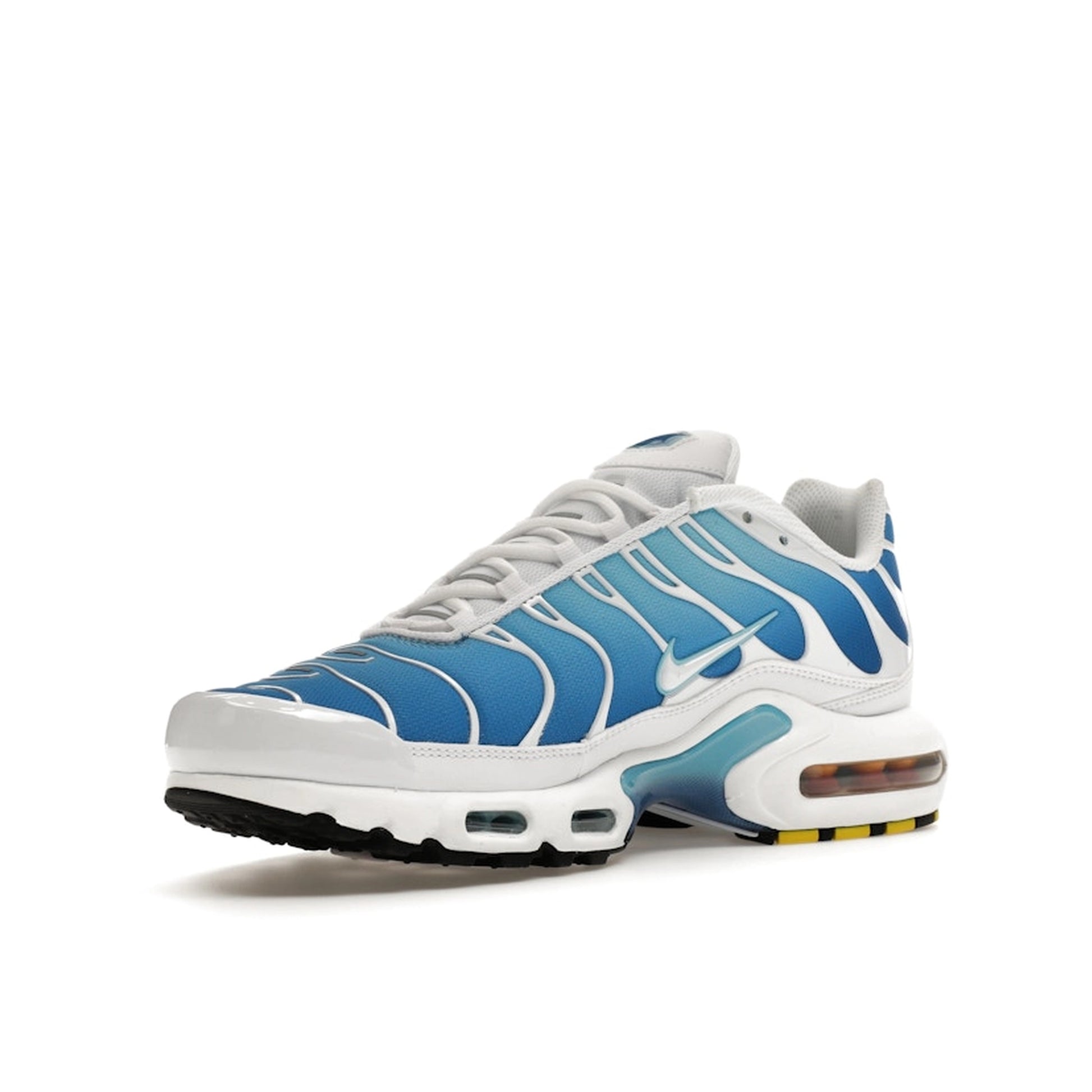 Nike Air Max Plus sneakers, front view, model 852630-411, in sky blue with black accents.