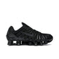 Nike Shox TL Black Metallic Hematite men’s leather sneakers, black with orange accents.