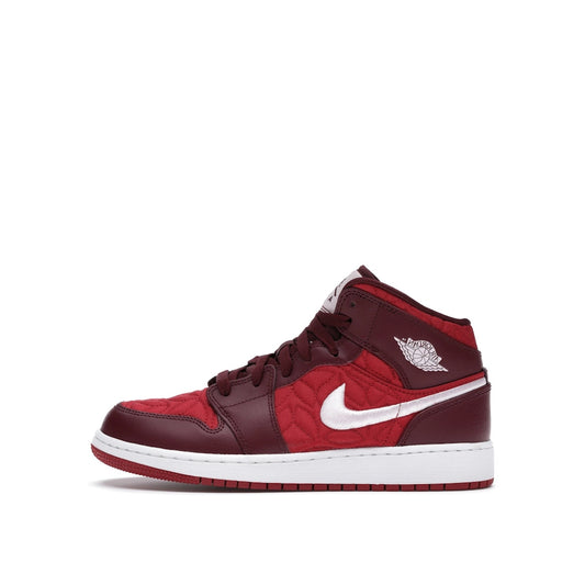 Jordan 1 Mid SE Red Quilt GS sneakers, side view, in red with quilted details.