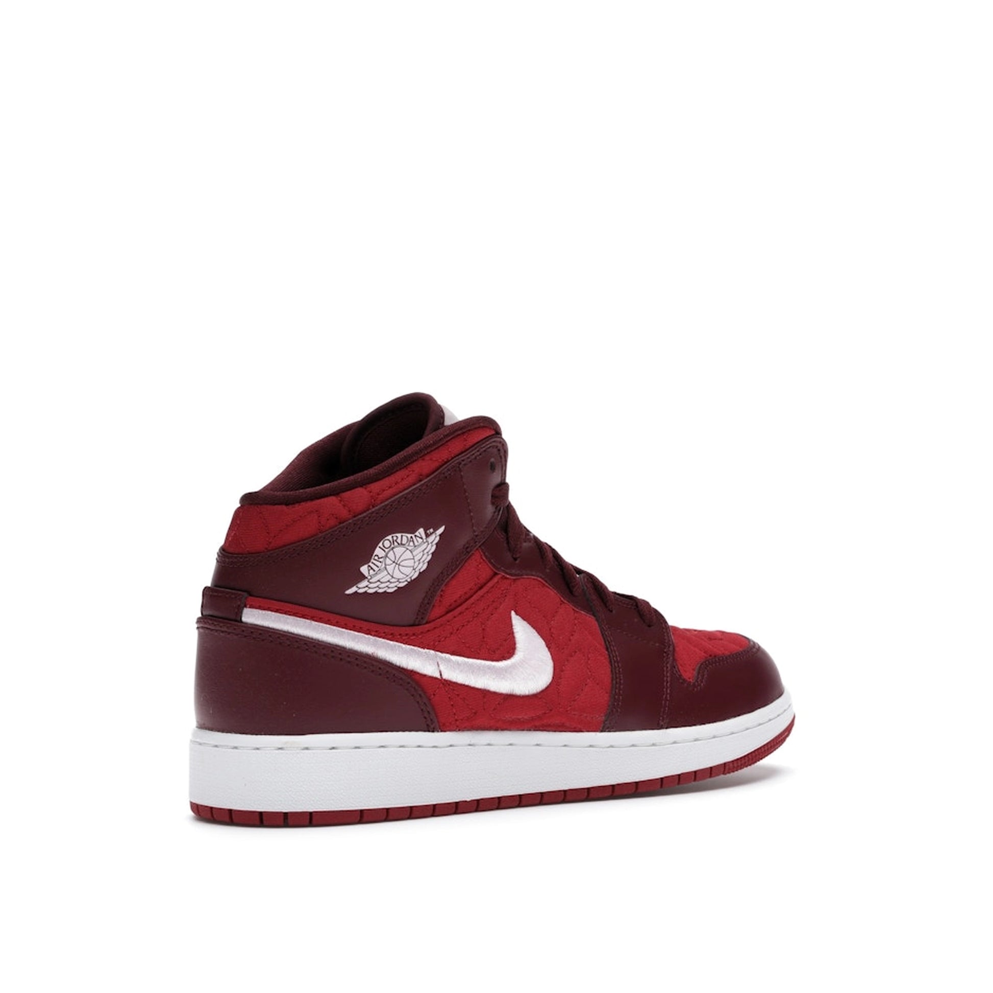 Jordan 1 Mid SE Red Quilt GS sneakers, back view, in red with quilted details.