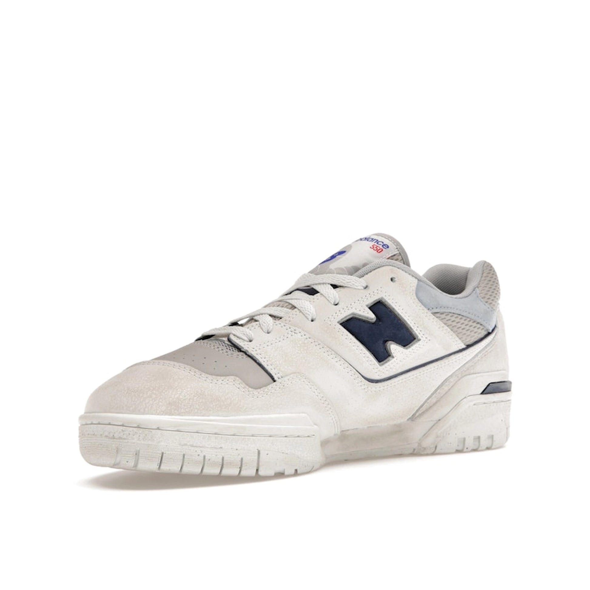 New Balance 550 sneakers, front view, model BB550GD1 in grey with white details.