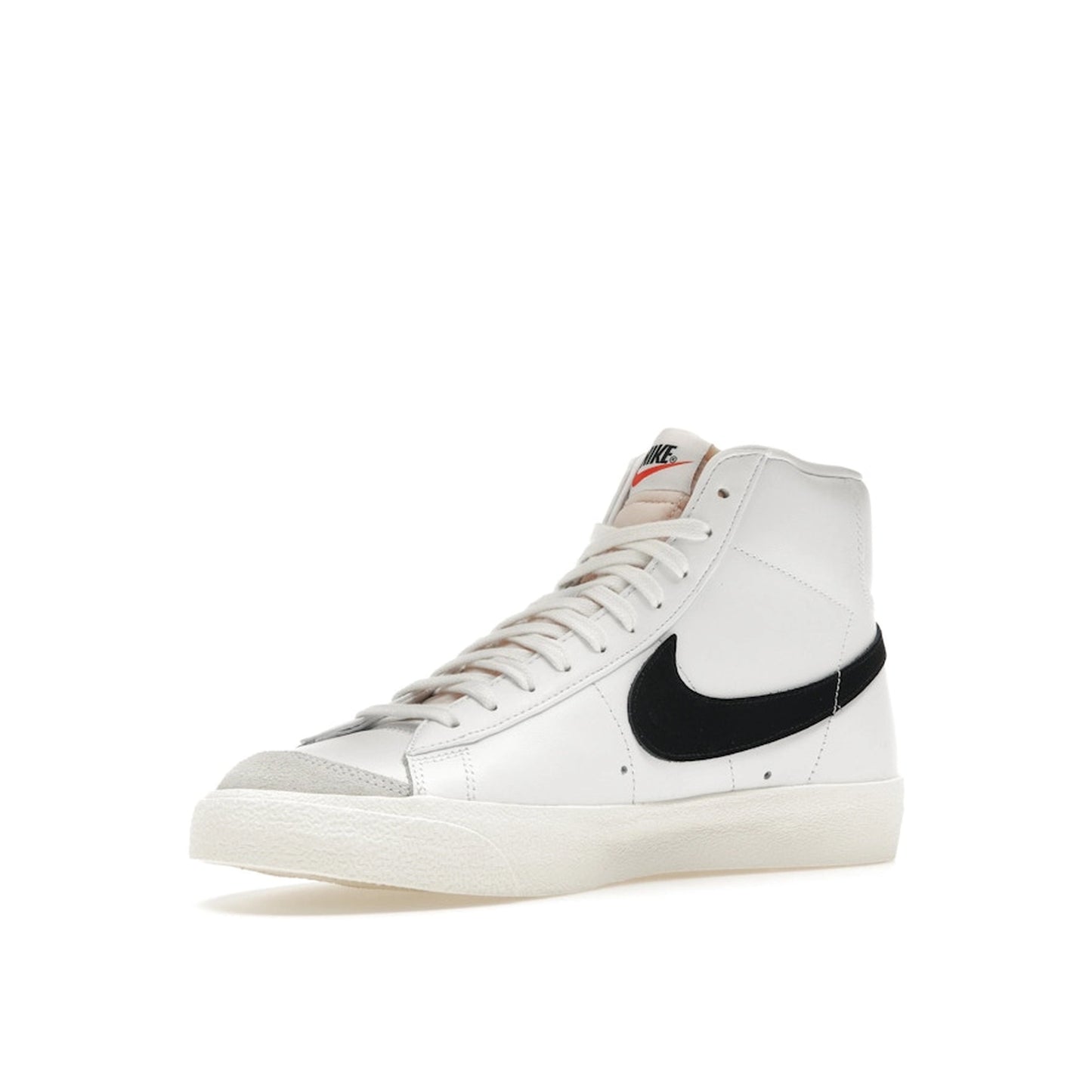 Nike Blazer Mid ’77 Vintage sneakers, front view, in white with black swoosh.