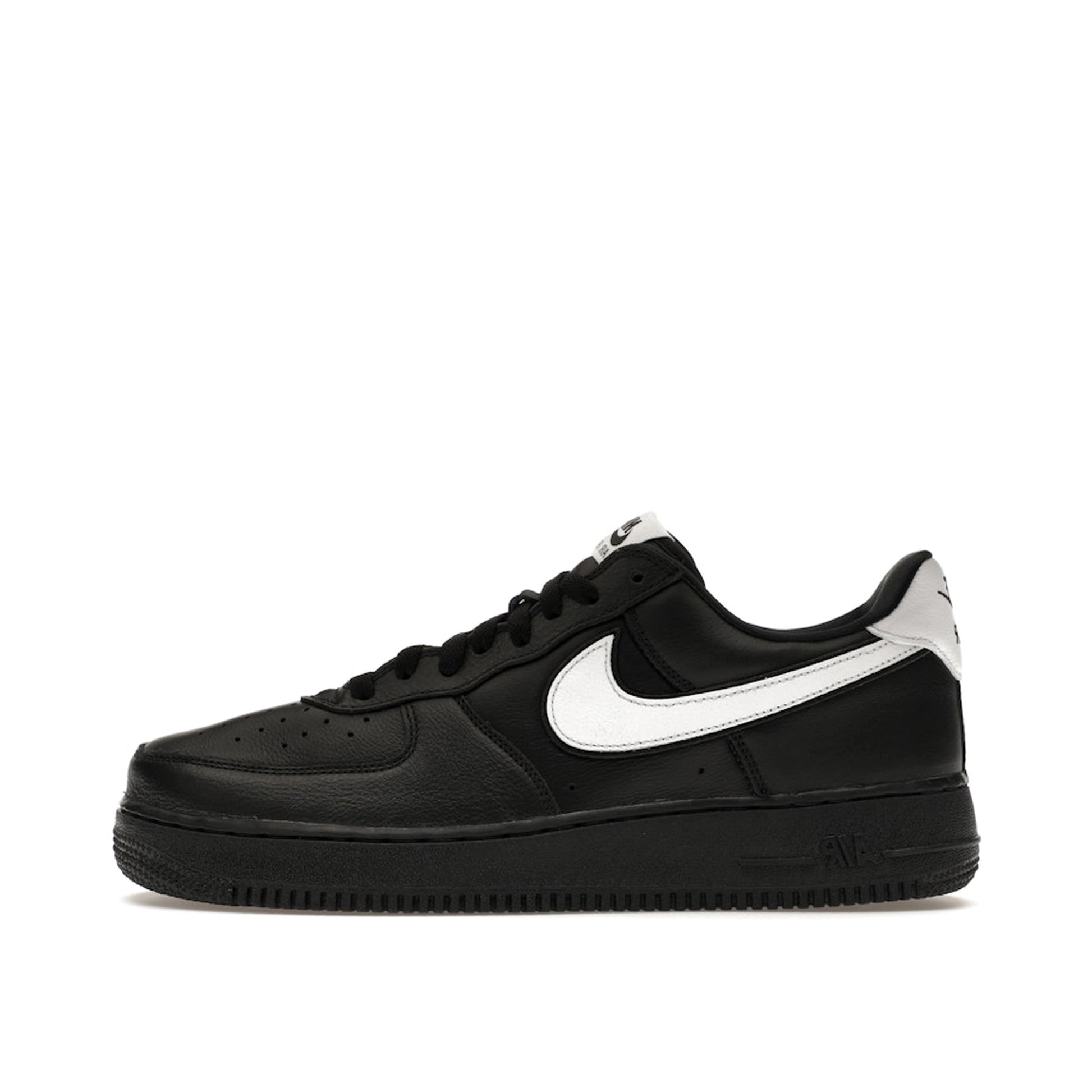 Nike Air Force 1 Low QS sneakers, side view, model CQ0492-001 in black with white details.