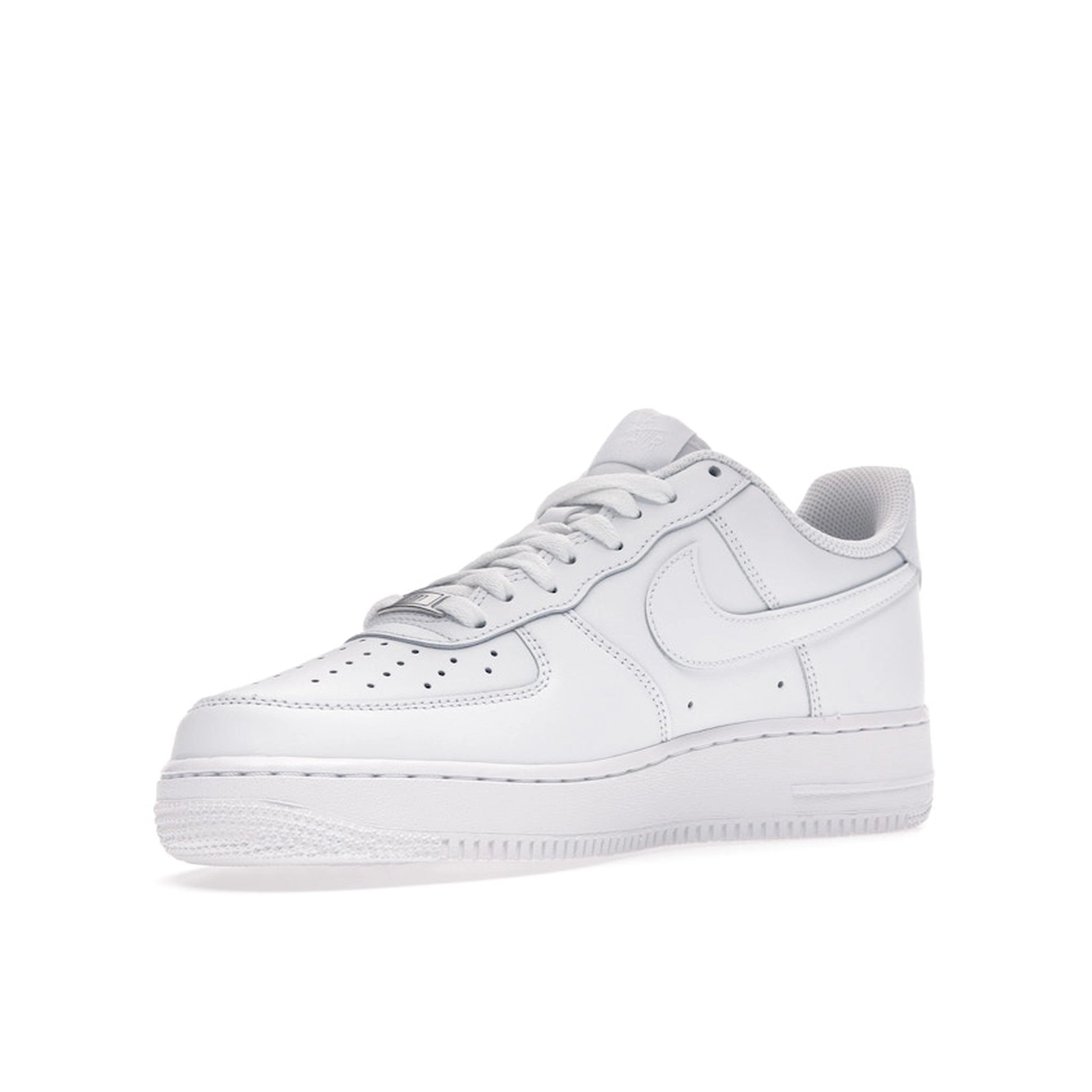Nike Air Force 1 Low sneakers, front view, in white with tonal branding.