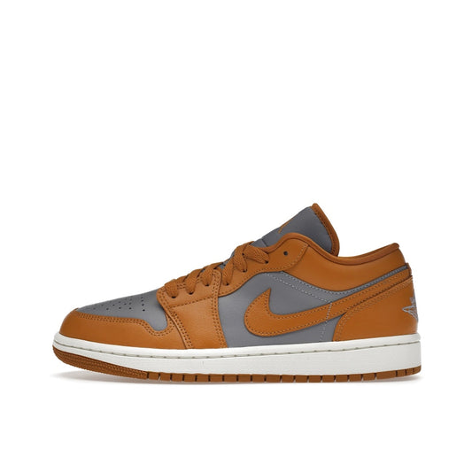 Air Jordan 1 Low Women’s sneakers, side view, in cement grey with chutney yellow accents.