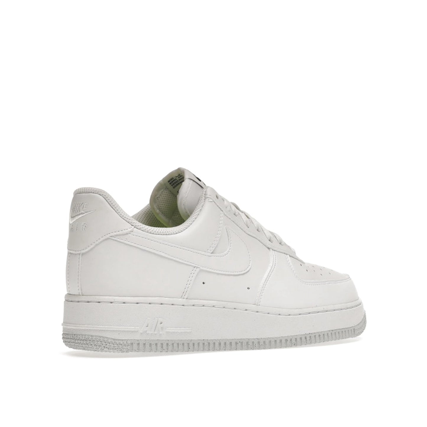 Nike Air Force 1 Low Next Nature Women's sneakers, back view, model DC9486-101, in white with metallic grey details.