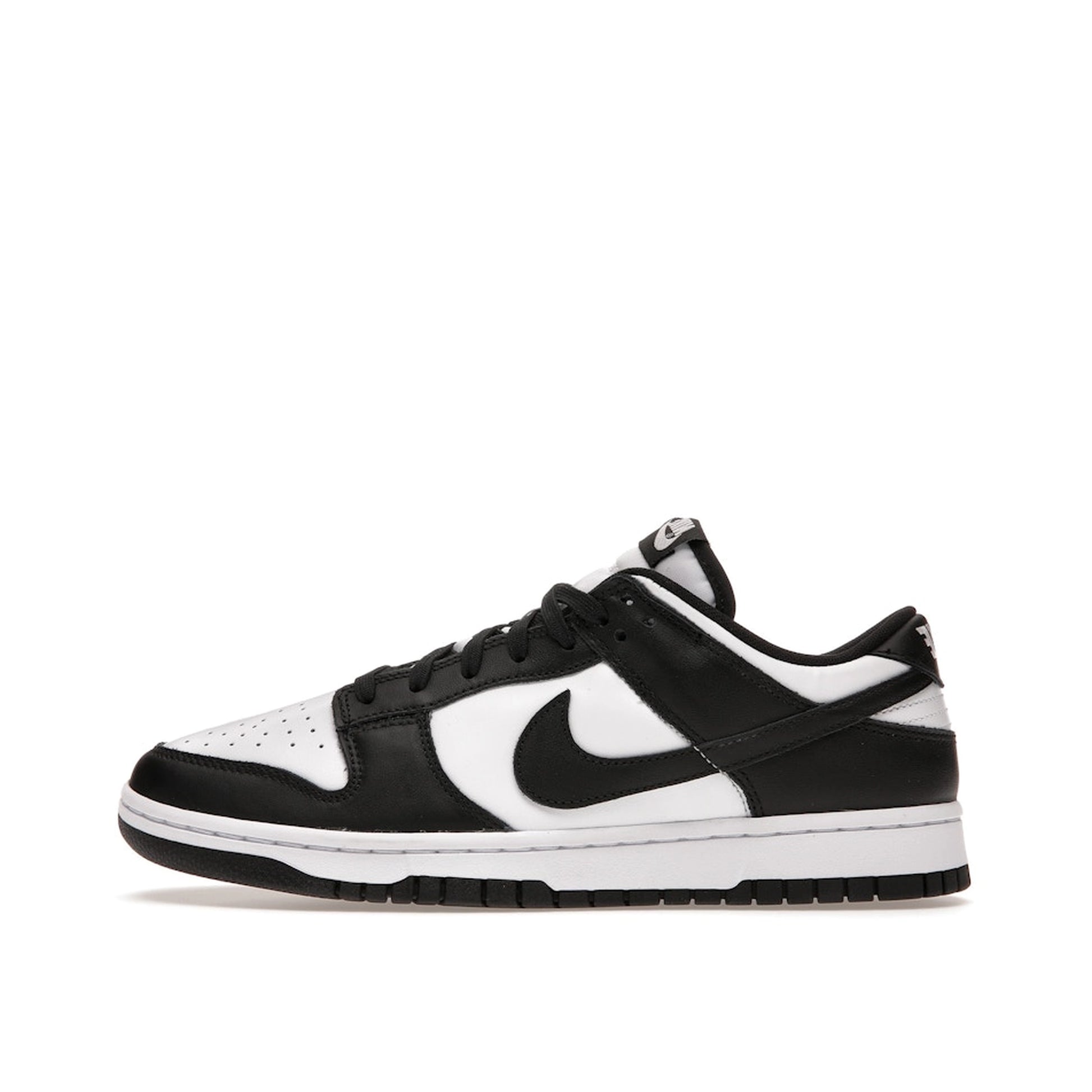 Nike Dunk Low Retro sneakers, side view, model DD1391-100 in white with black panda details.