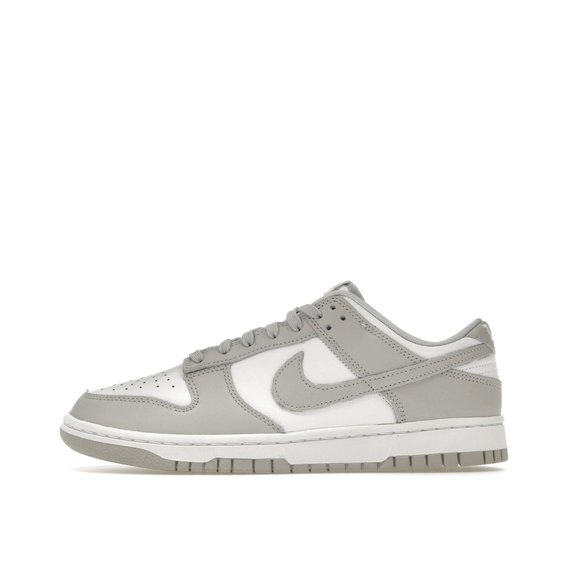 Nike Dunk Low sneakers in Grey Fog, side view, model DD1391-103 in grey and white.