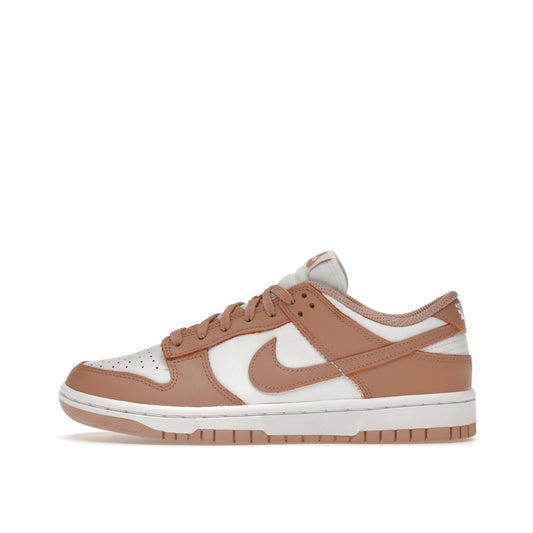 Nike Dunk Low Rose Whisper Women’s sneakers, side view, in white with soft pink overlays.