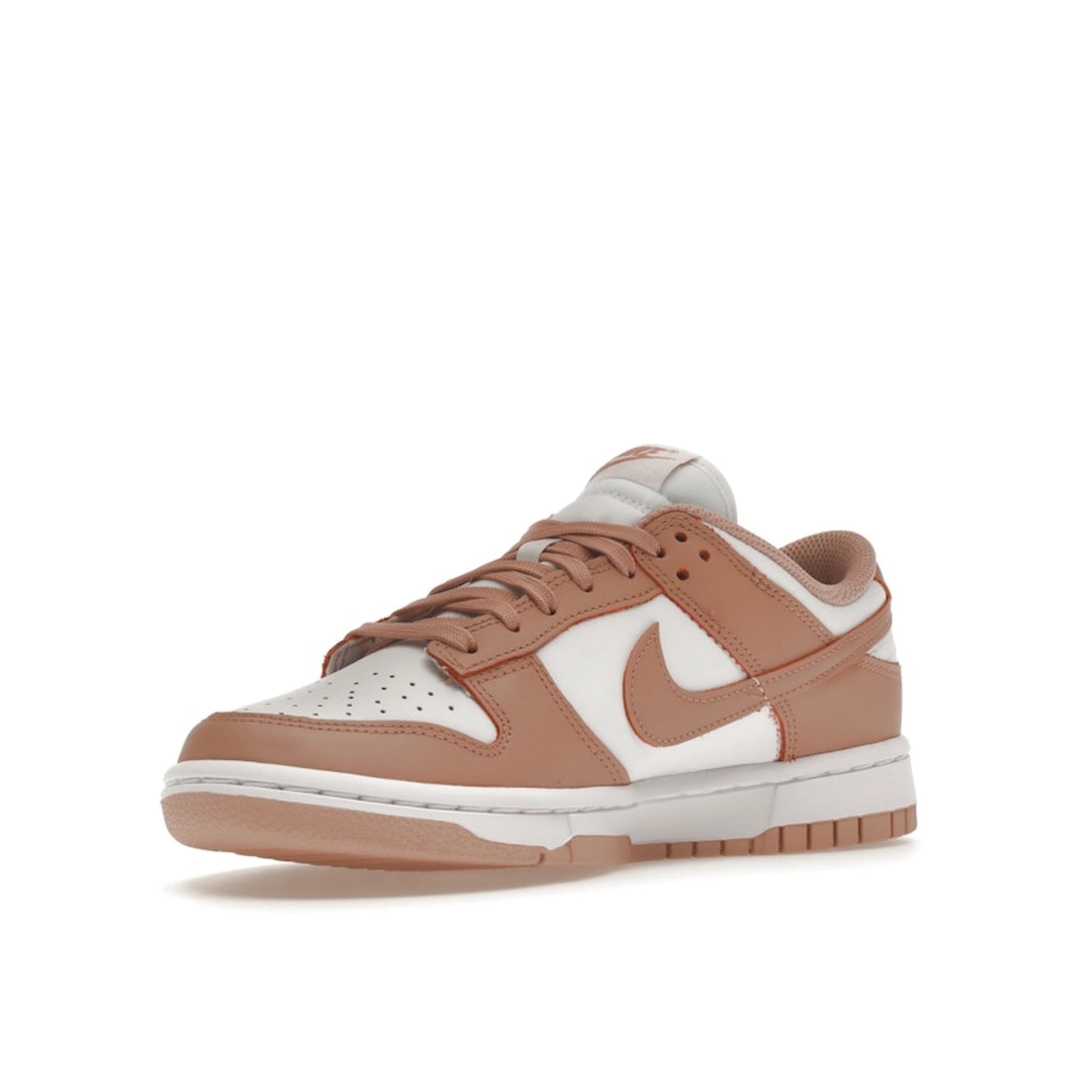 Nike Dunk Low Rose Whisper Women’s sneakers, front view, in white with soft pink overlays.