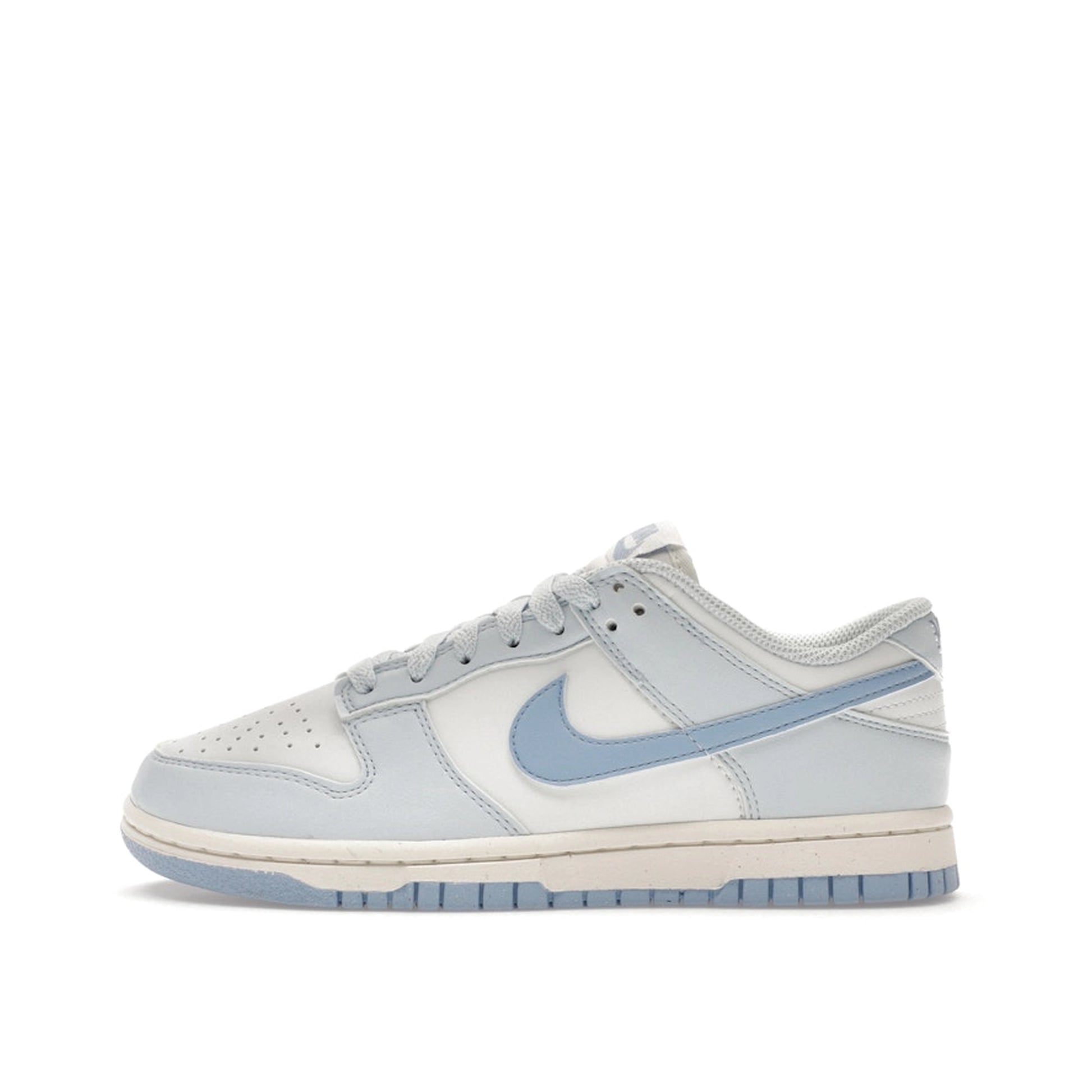 Nike Dunk Low Next Nature Women's sneakers, side view, model DD1873-400, in blue tint with a sleek finish.