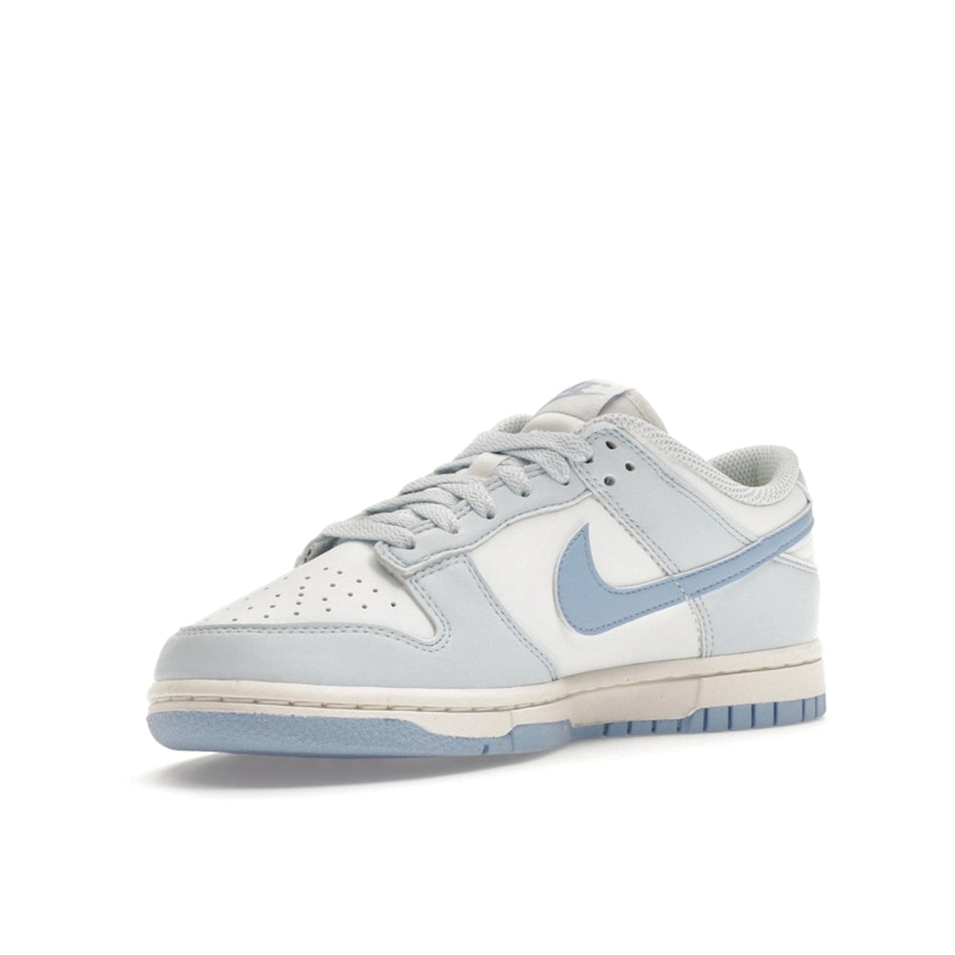 Nike Dunk Low Next Nature Women's sneakers, front view, model DD1873-400, in blue tint with a sleek finish.