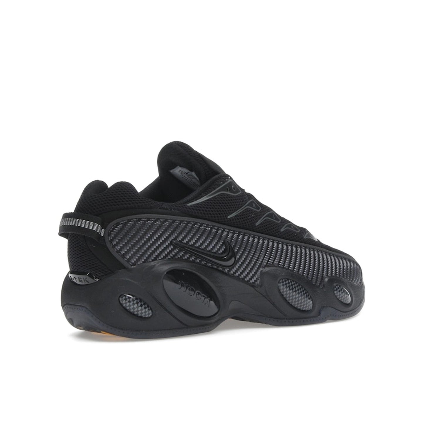 Nike NOCTA Glide Black Iron Grey, side view, athletic silhouette with signature NOCTA styling.