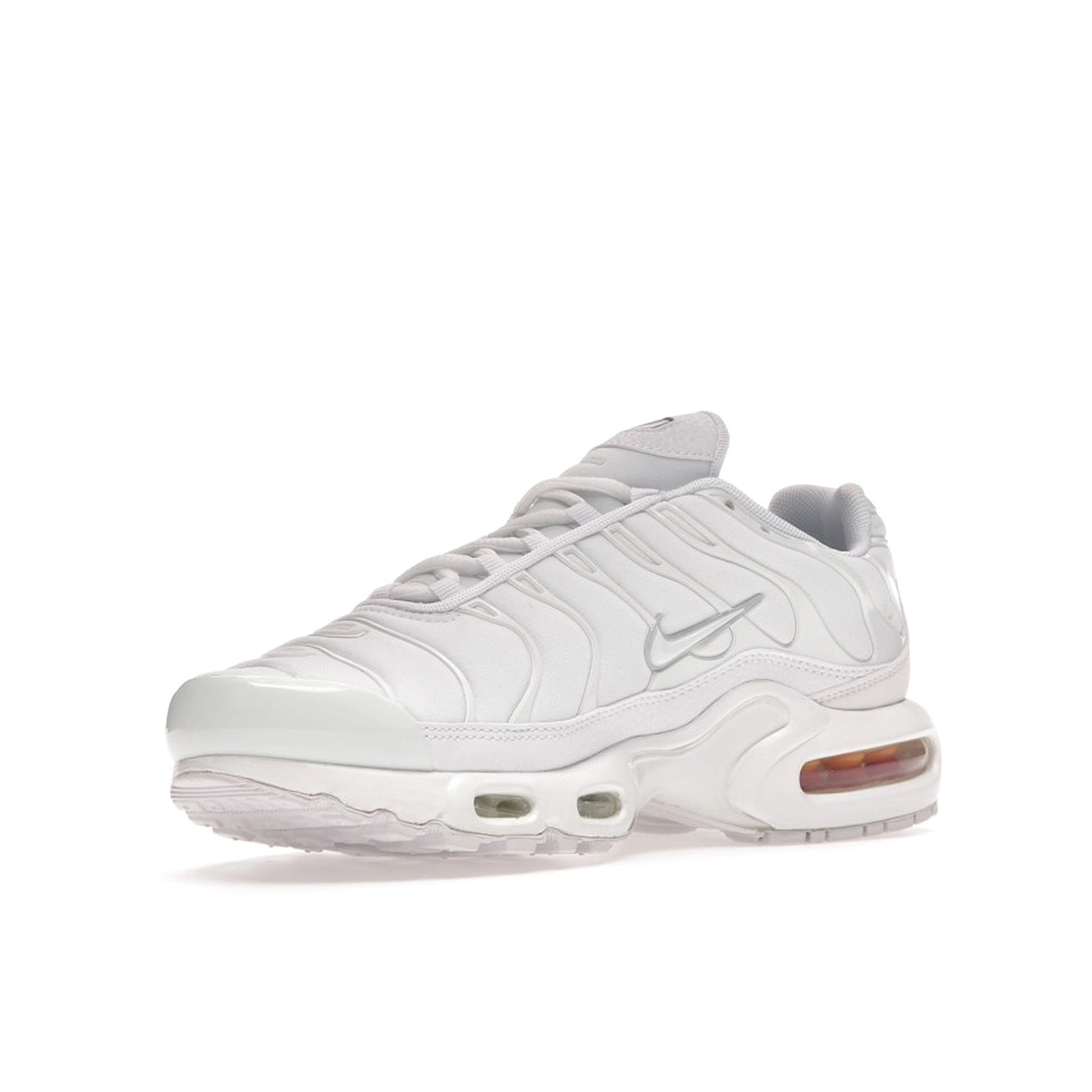 Nike Air Max Plus sneakers, front view, in all-white triple white colorway.
