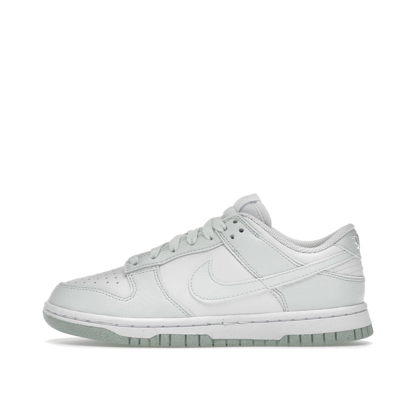 Nike Dunk Low Next Nature Women's sneakers, side view, model DN1431-102 in white with mint green details.