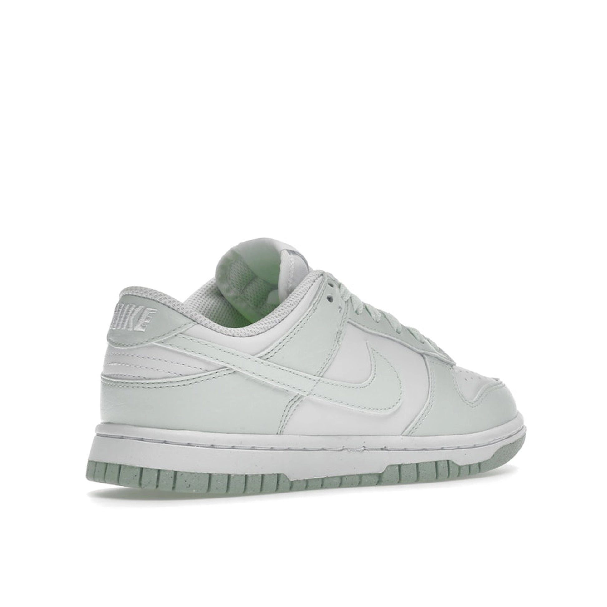 Nike Dunk Low Next Nature Women's sneakers, back view, model DN1431-102 in white with mint green details.