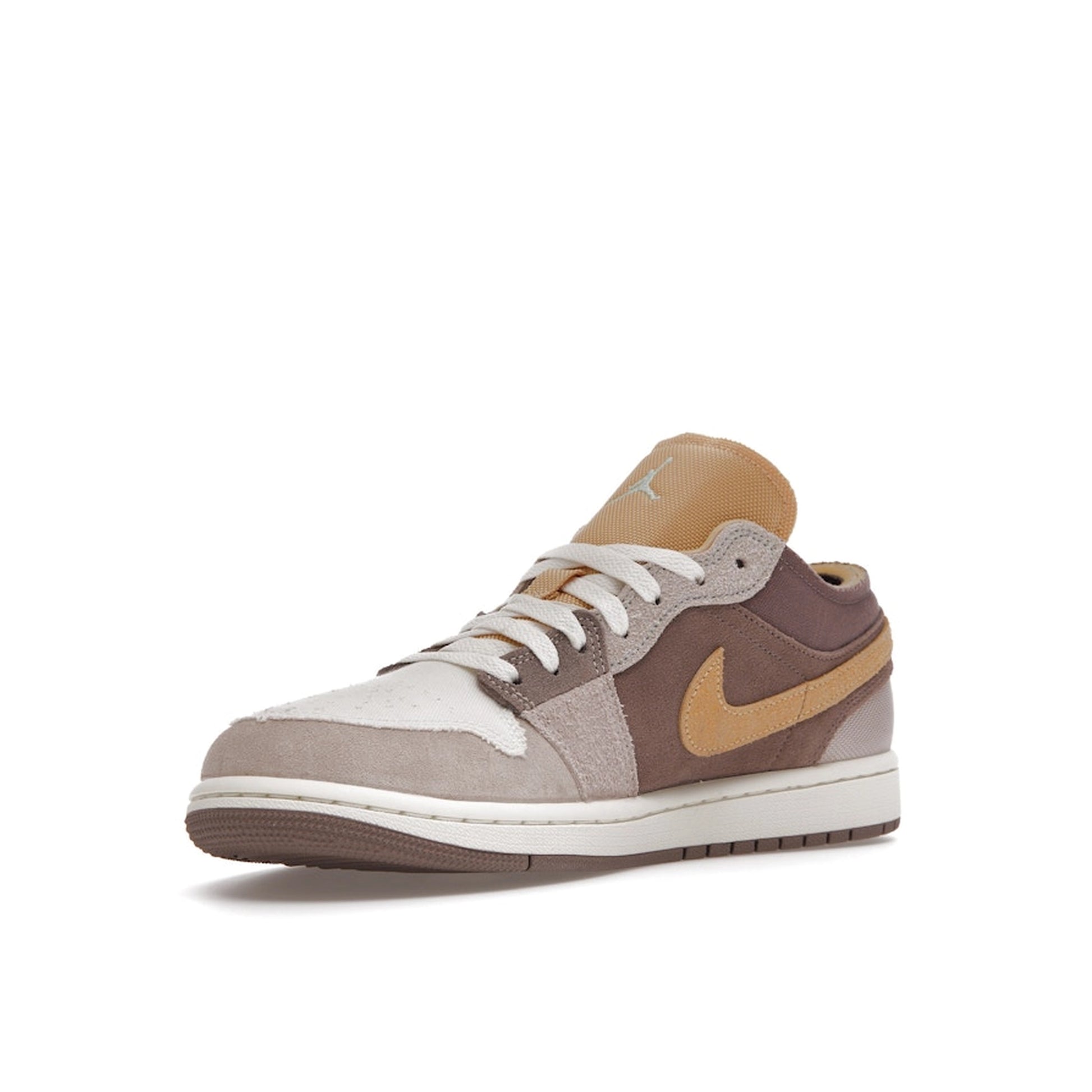 Air Jordan 1 Low SE Craft sneakers, front view, model DN1635-200, taupe haze with beige and white accents.