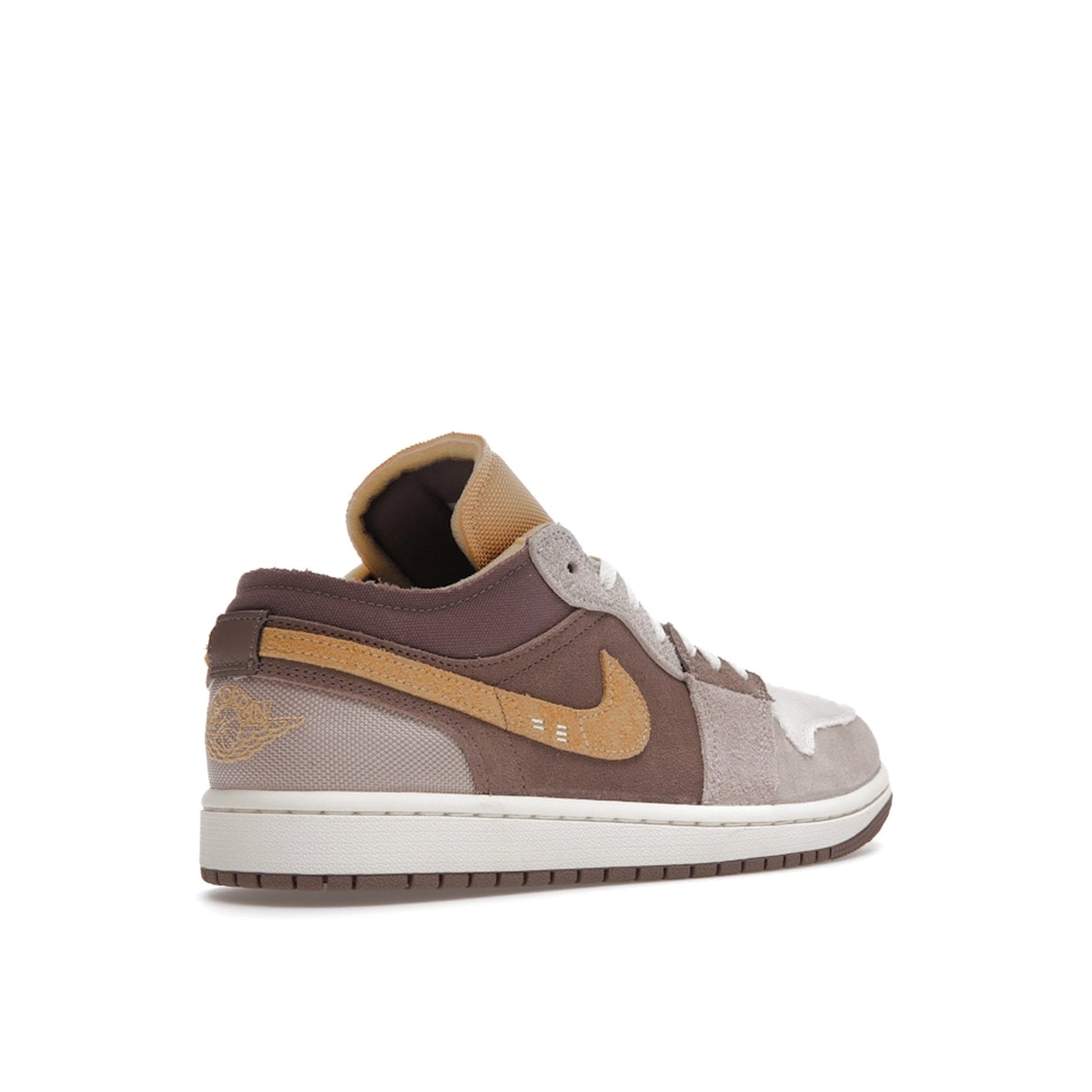 Air Jordan 1 Low SE Craft sneakers, back view, model DN1635-200, taupe haze with beige and white accents.