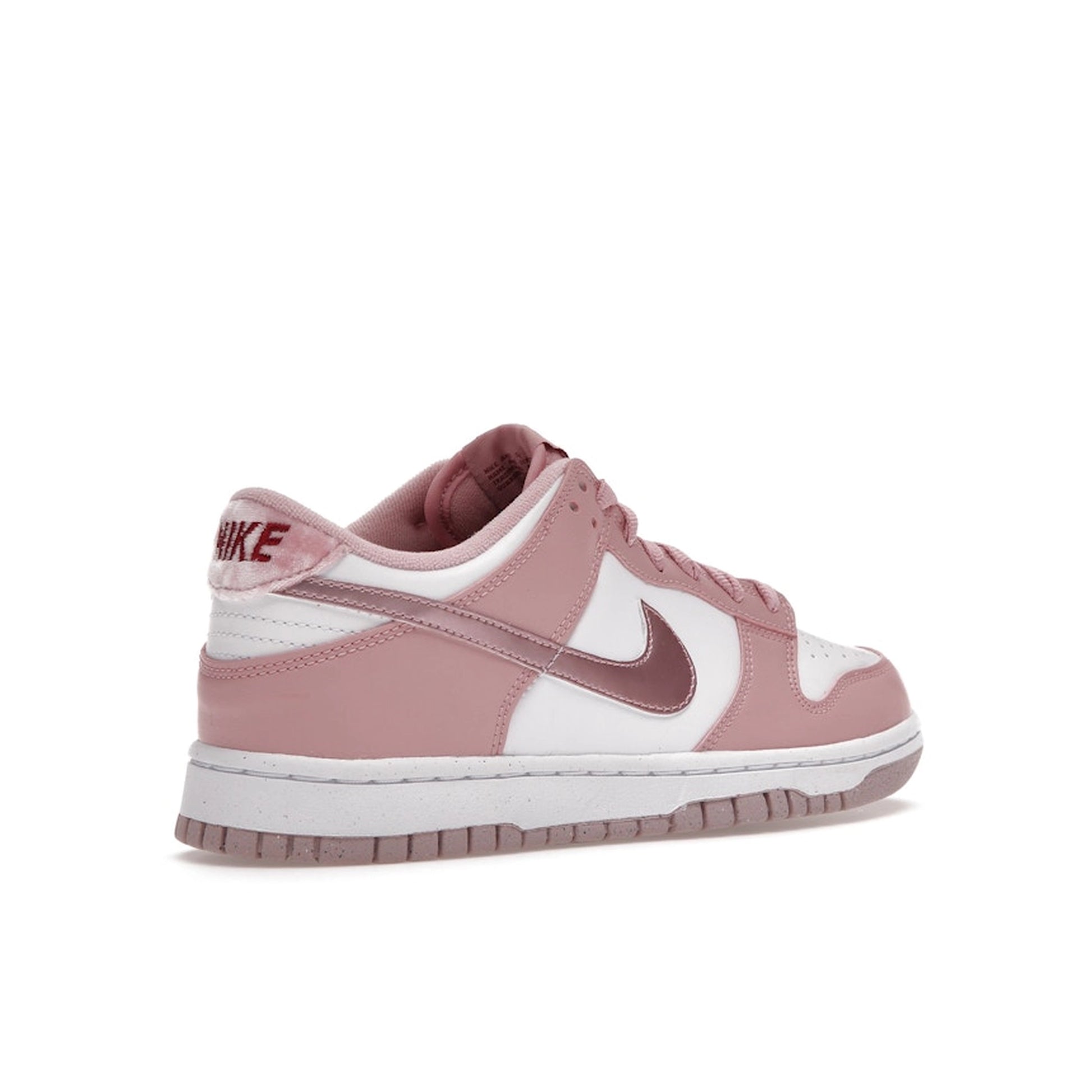 Nike Dunk Low Pink Velvet (GS), back view, in soft pink with rich velvet heel tab.