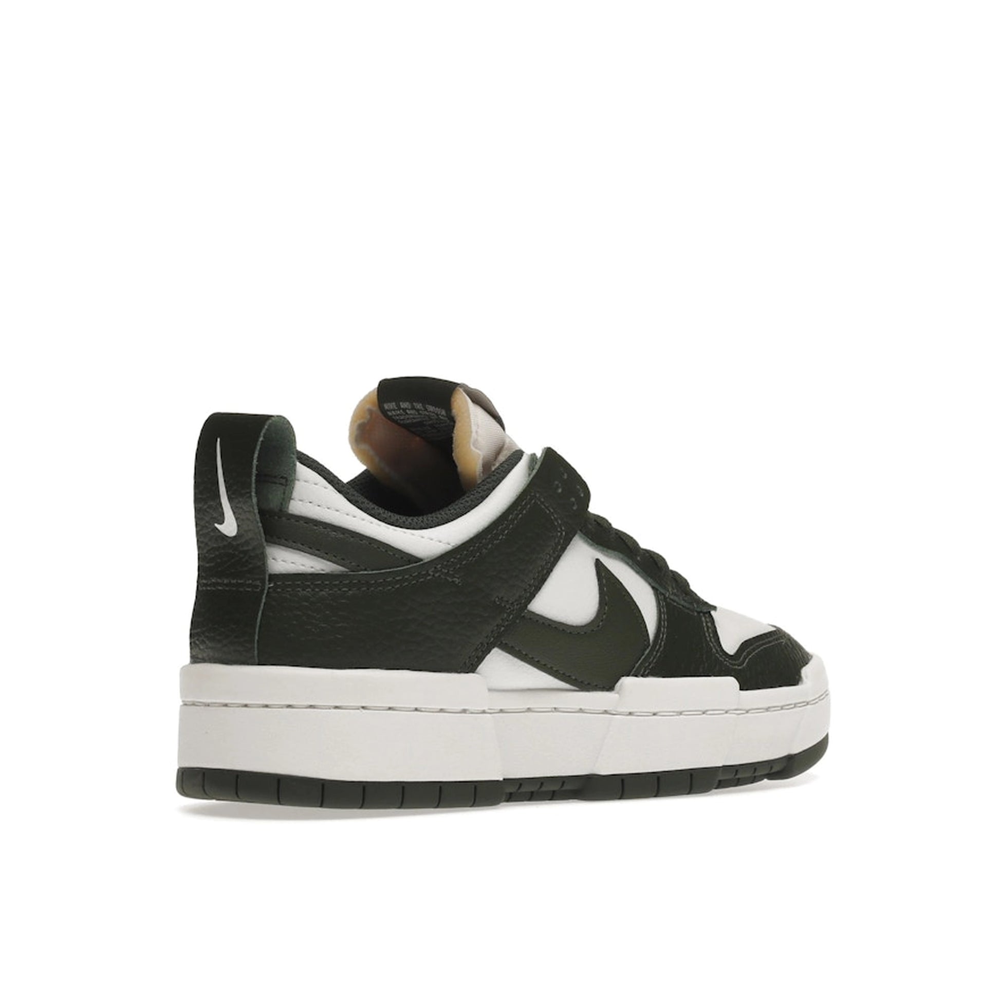 Nike Dunk Low Disrupt, back view, in forest green overlays with clean white leather panels.