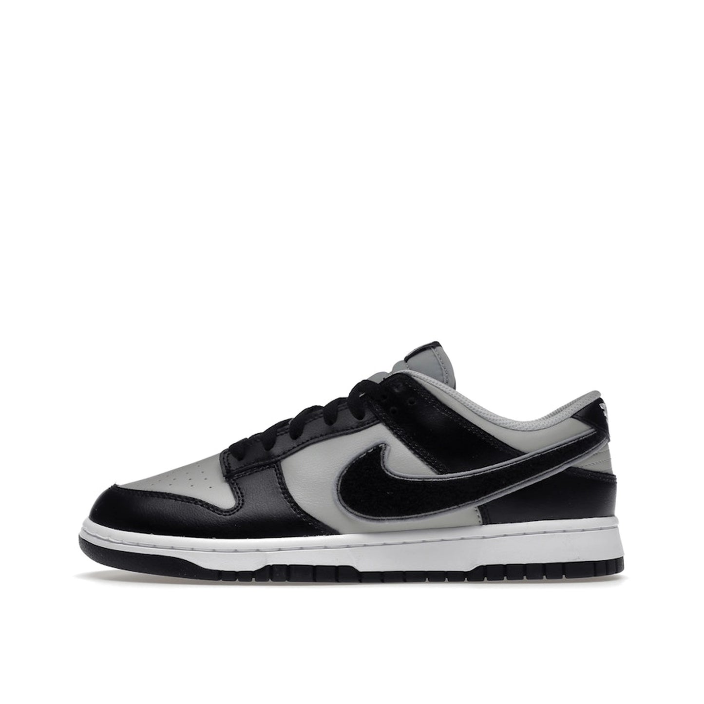 Nike Dunk Low Chenille Swoosh sneakers, side view, model DQ7683-001 in black and grey.