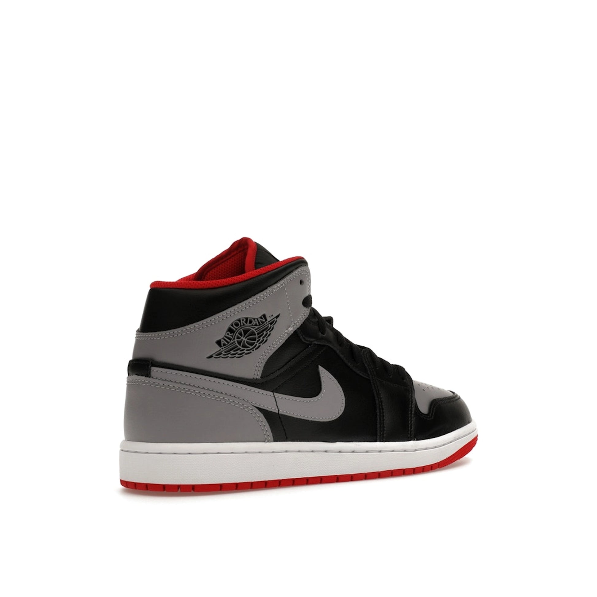 Jordan 1 Mid Bred Shadow sneakers, back view, model DQ8426-006, in black and red.