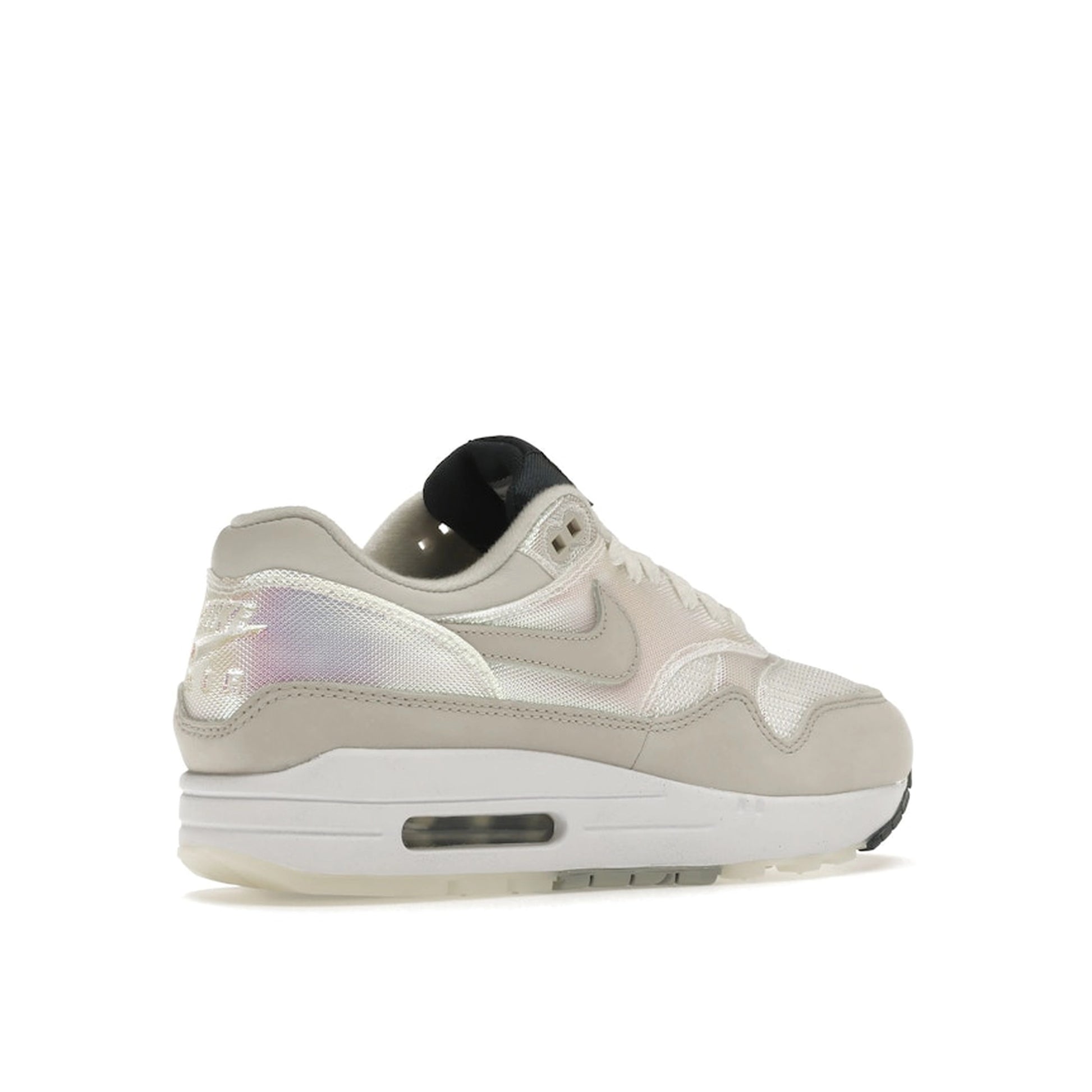 Nike Air Max 1 AMD La Ville Lumière Women's sneakers, back view, model DQ9326-100 in white with light accents.