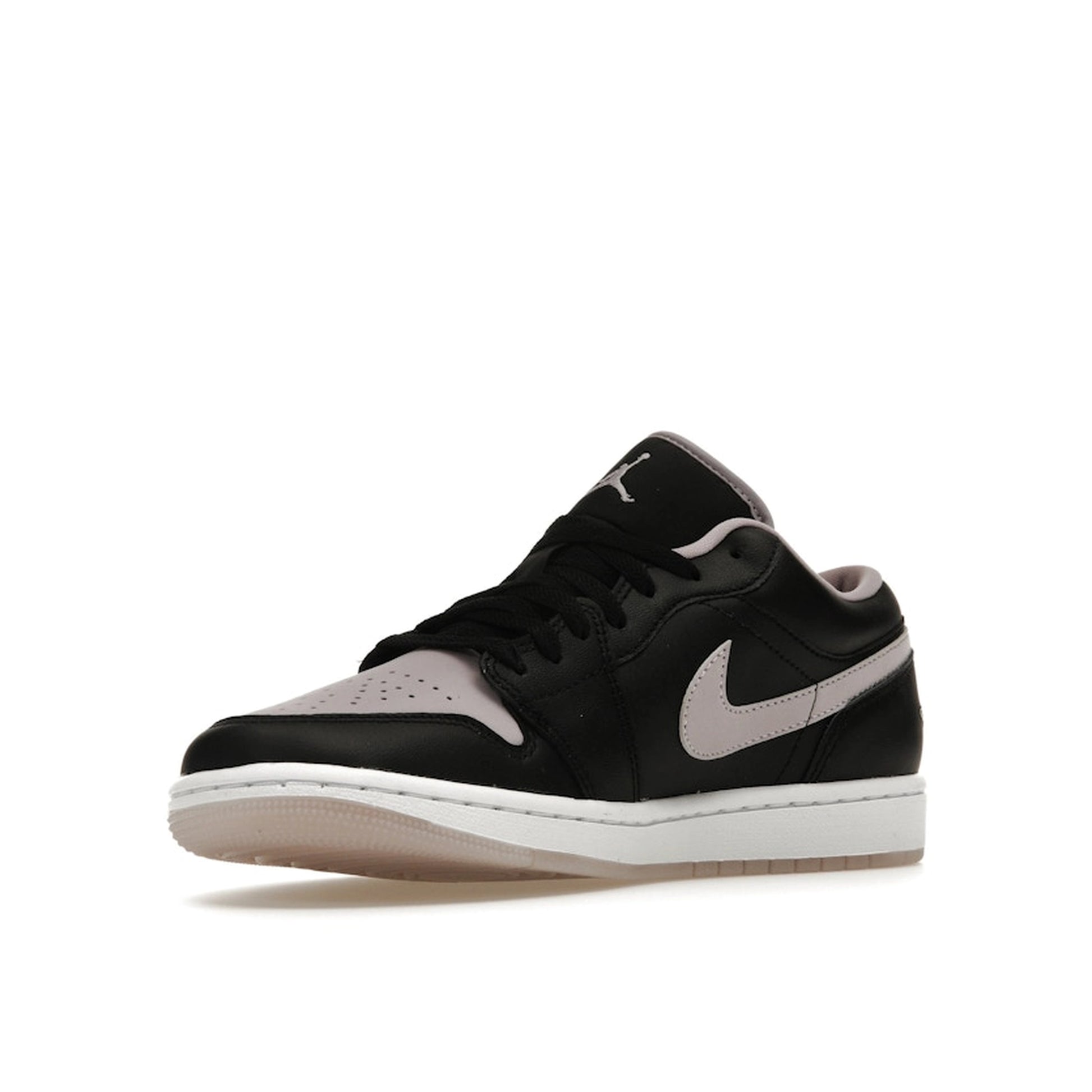 Jordan 1 Low SE sneakers, front view, model DV1309-051, black with iced lilac accents.