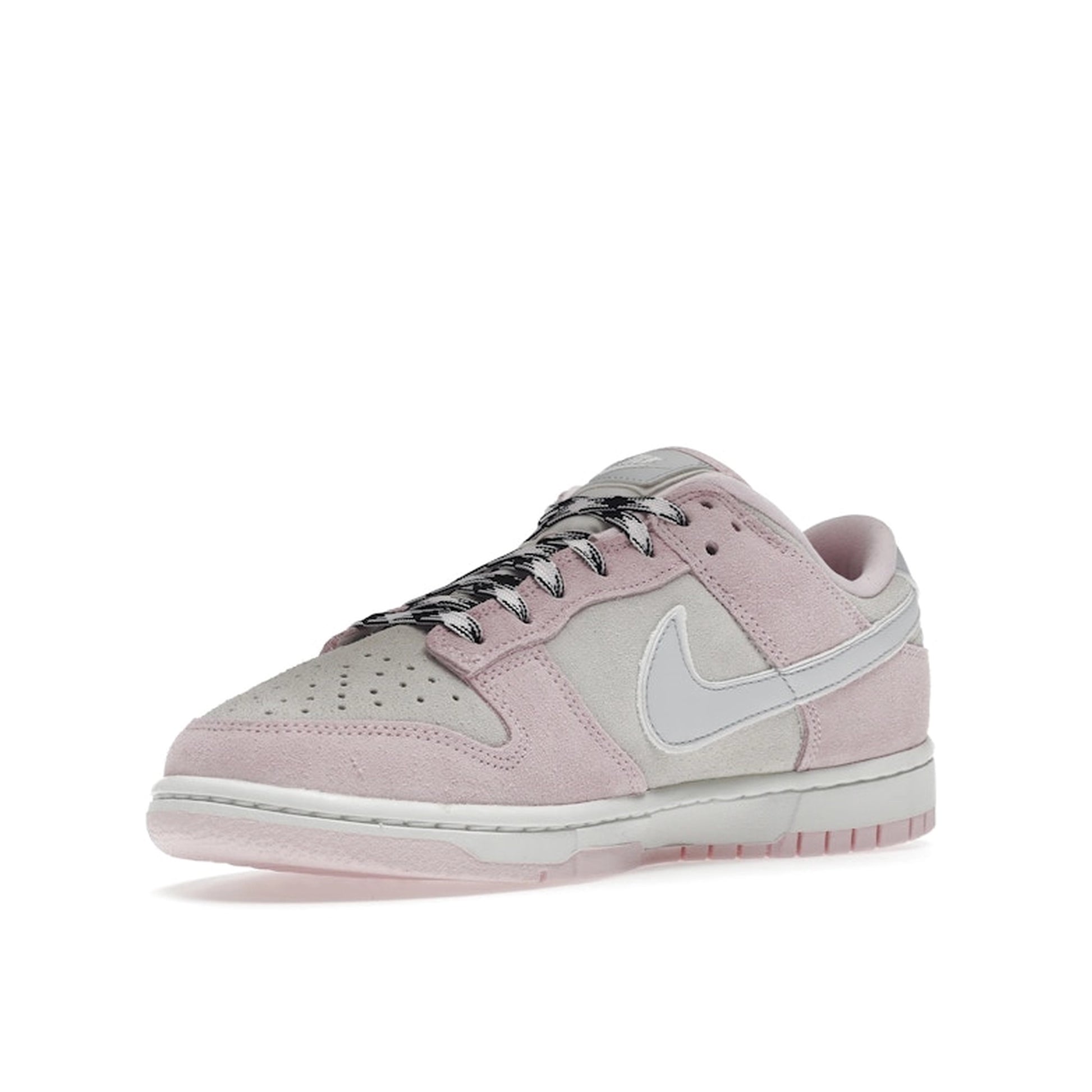 Nike Dunk Low LX Women's sneakers, front view, model DV3054-600 in pink foam with white details.