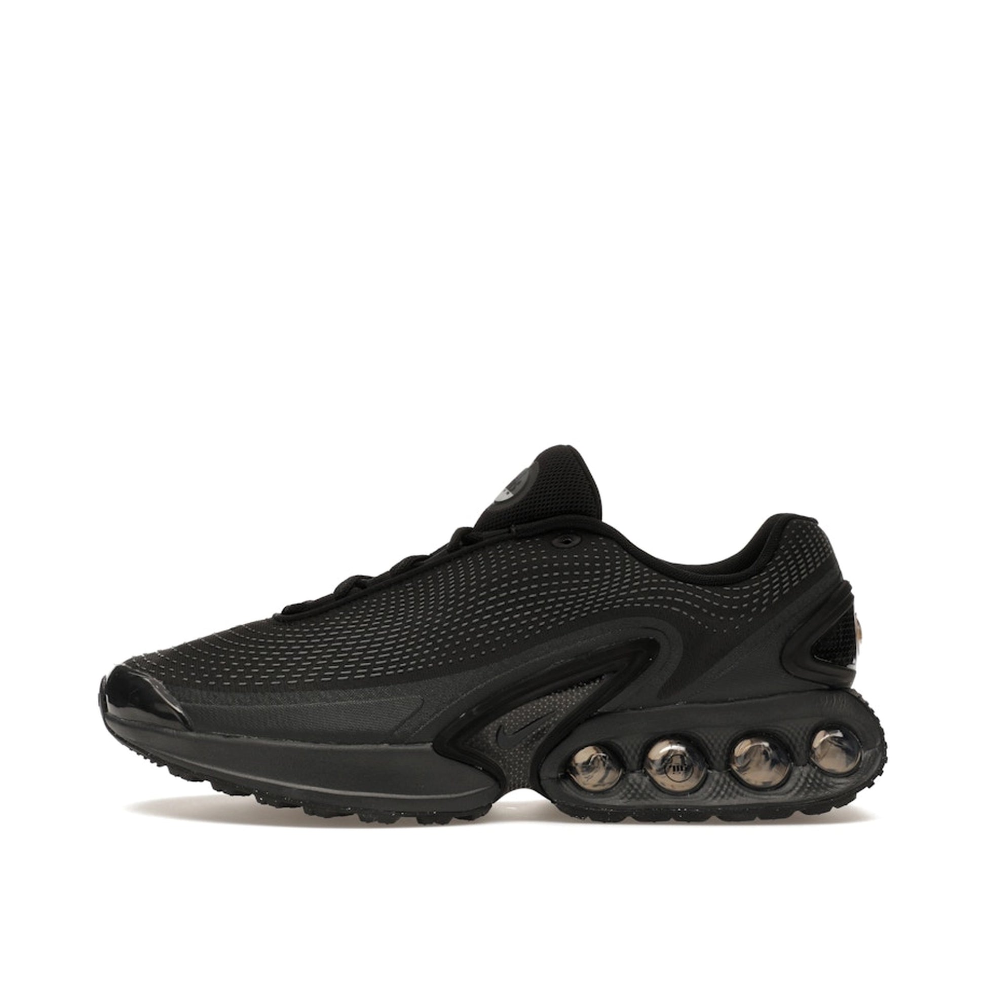 Nike Air Max DN sneakers, side view, model DV3337-002 in black with dark smoke grey details.