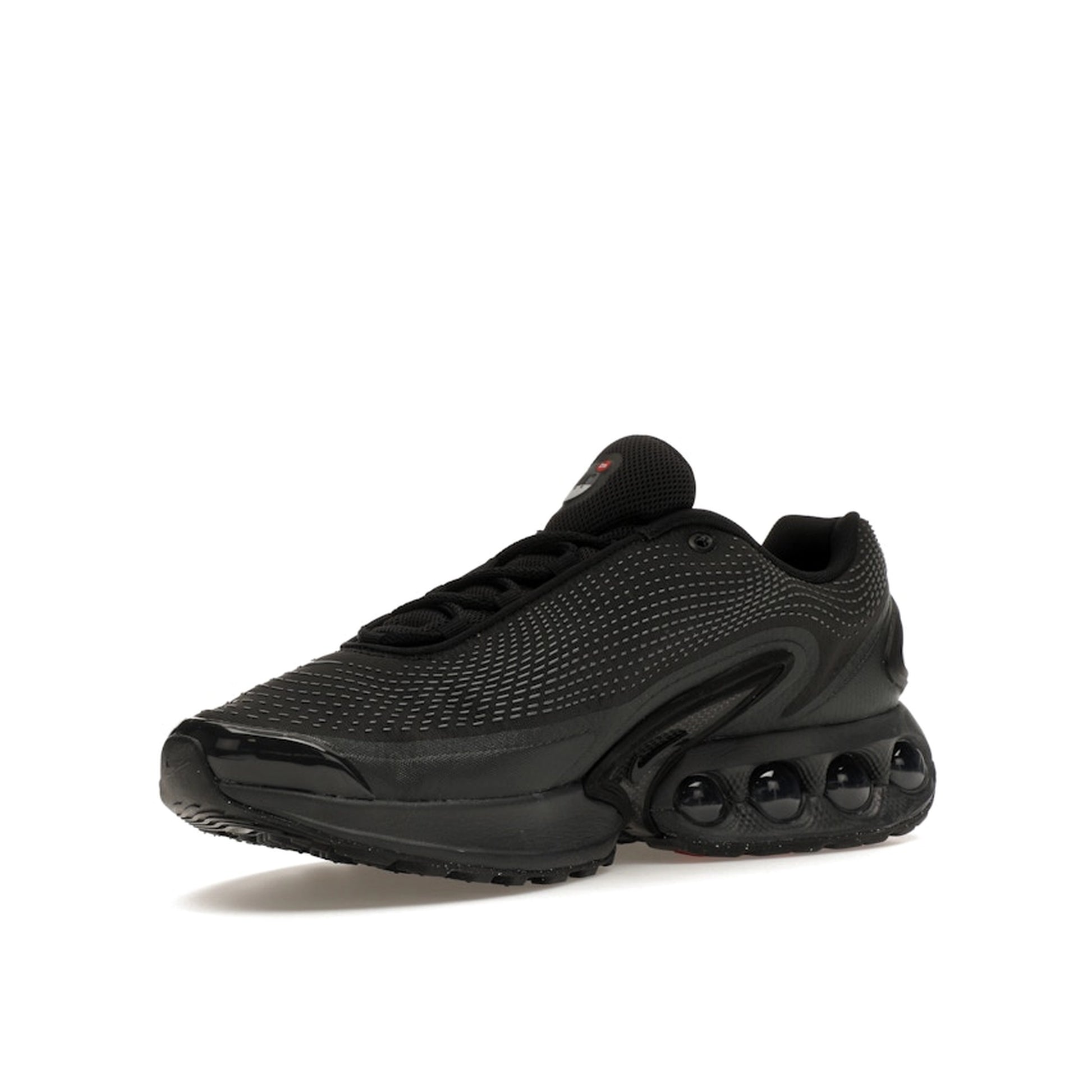 Nike Air Max DN sneakers, front view, model DV3337-002 in black with dark smoke grey details.