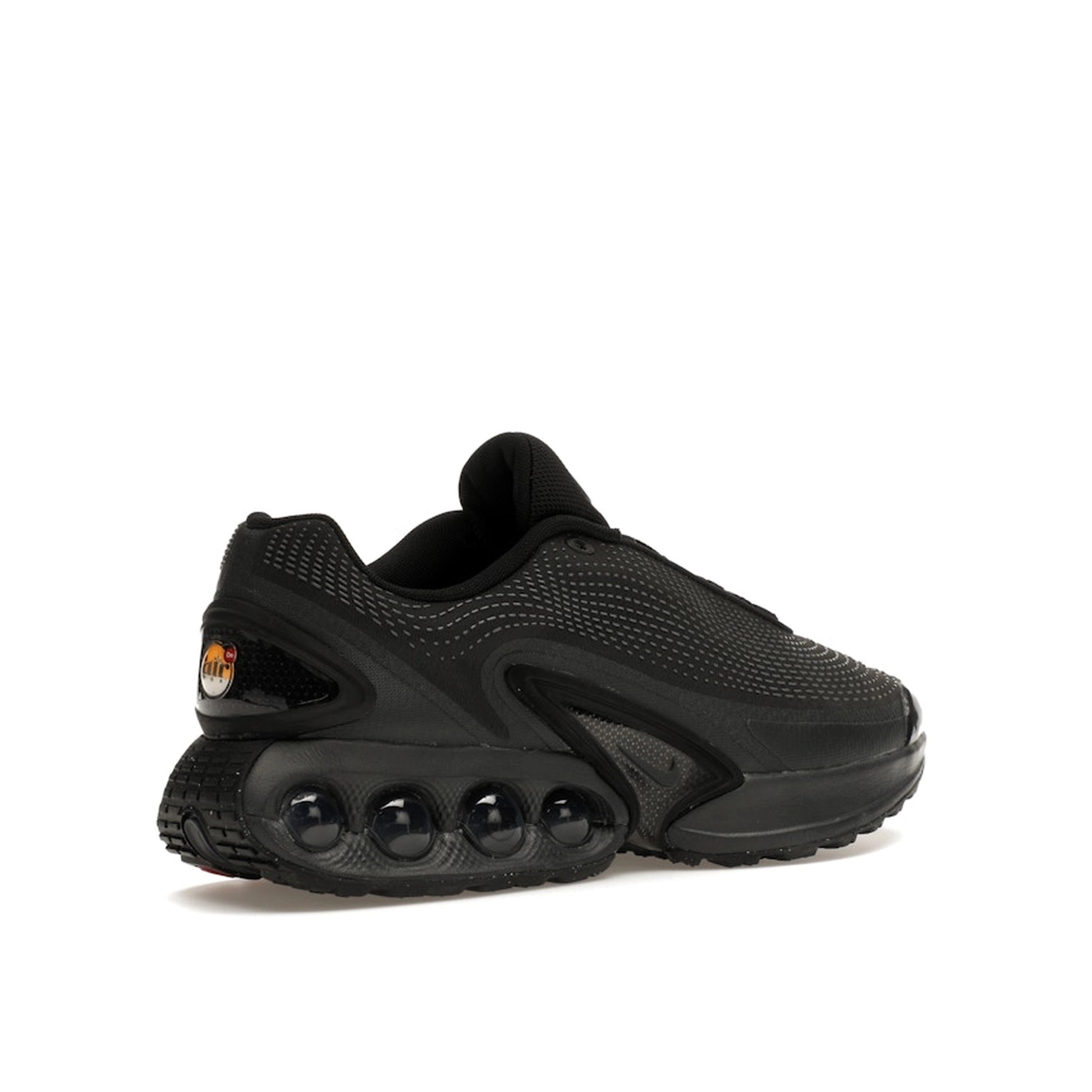 Nike Air Max DN sneakers, back view, model DV3337-002 in black with dark smoke grey details.