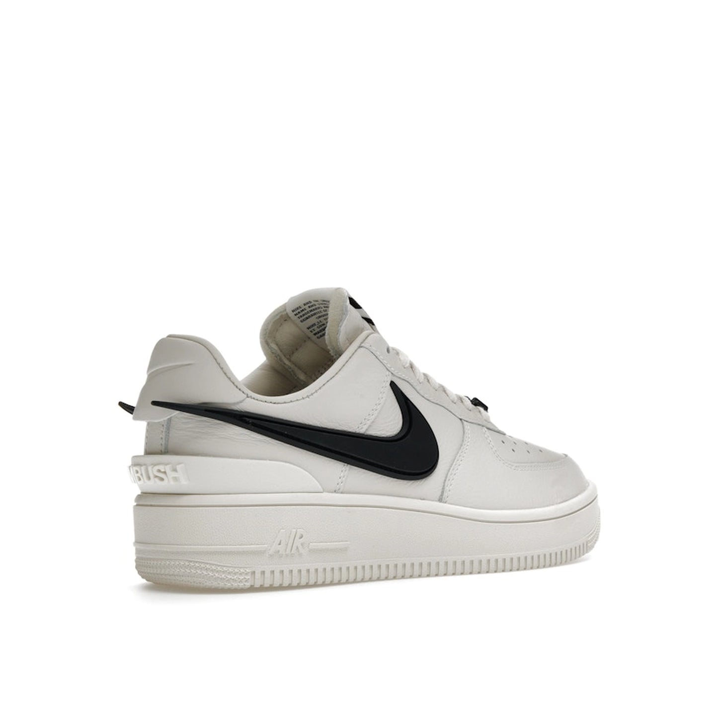 Nike Air Force 1 Low SP AMBUSH sneakers, back view, model DV3464-002, in Phantom white with black 3D swoosh.