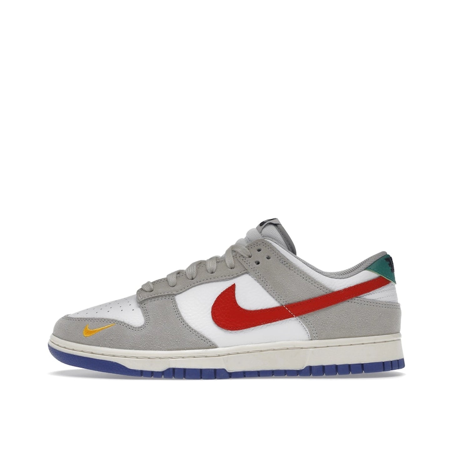 Nike Dunk Low sneakers, side view, model DV3497-001 in light iron ore with red and blue details.