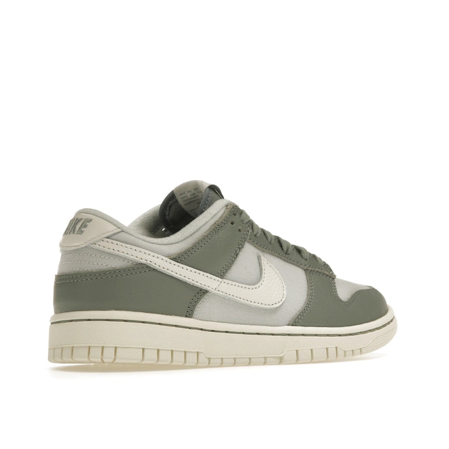 Nike Dunk Low sneakers, back view, model DV7212-300 in mica green with white and grey details.