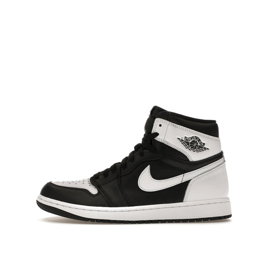 Jordan 1 Retro High OG sneakers, side view, model DZ5485-010, in black and white with classic styling.