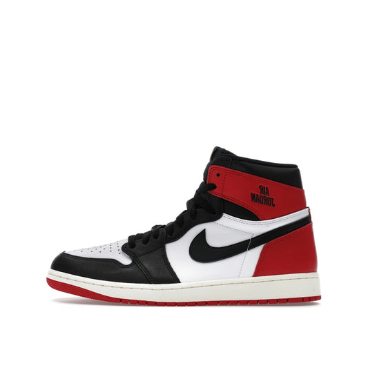 Jordan 1 Retro High OG sneakers, side view, in Black Toe Reimagined colorway.