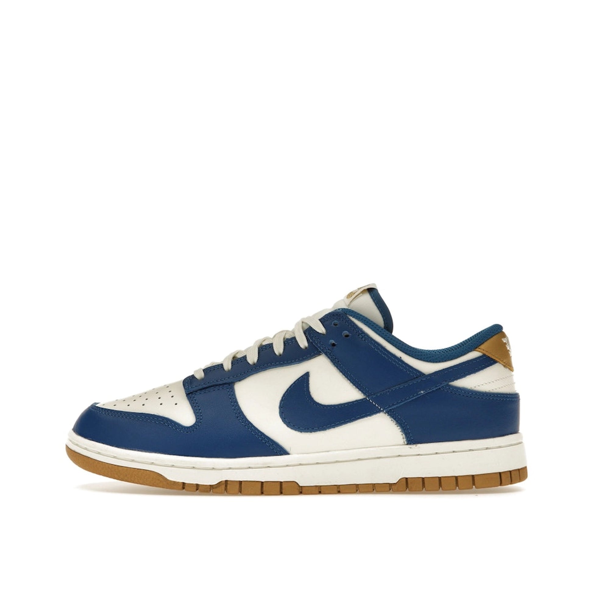 Nike Dunk Low Kansas City Royals Women’s sneakers, side view, in white and royal blue.