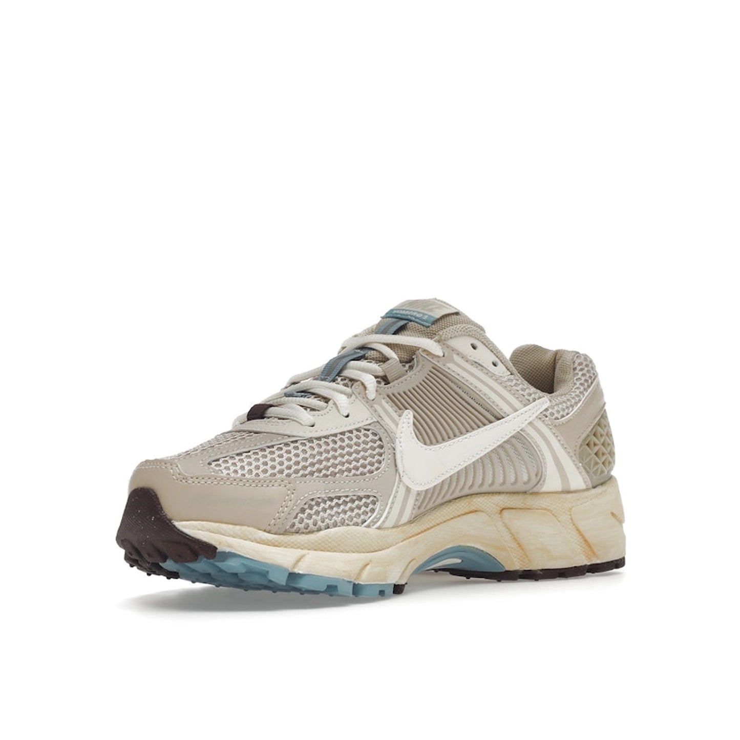 Nike Zoom Vomero 5 Women's sneakers, front view, model FB8825-111 in oatmeal with beige and white details.