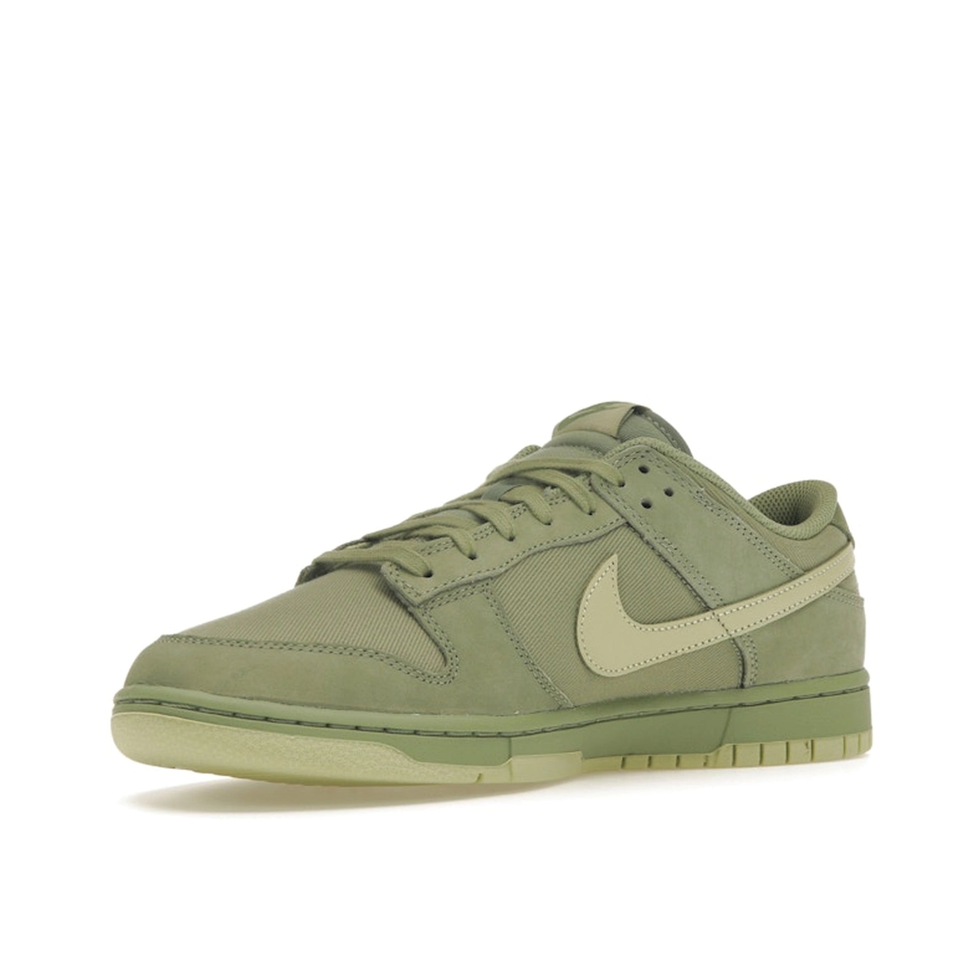 Nike Dunk Low Retro Premium sneakers, front view, model FB8895-300 in oil green color.